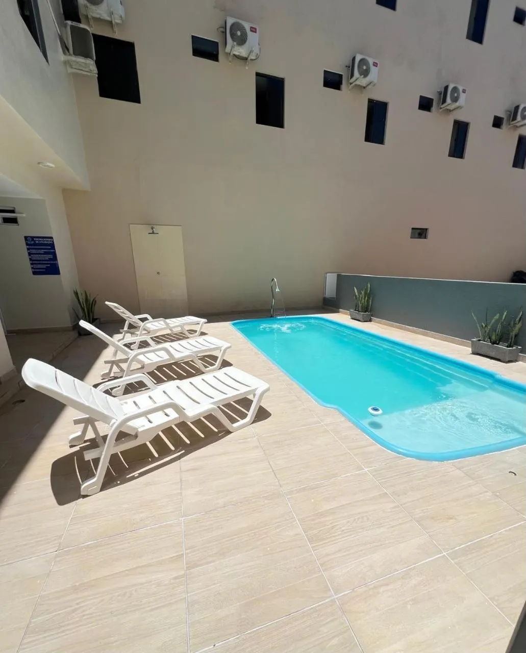 Swimming pool in Pousada Praia Bela