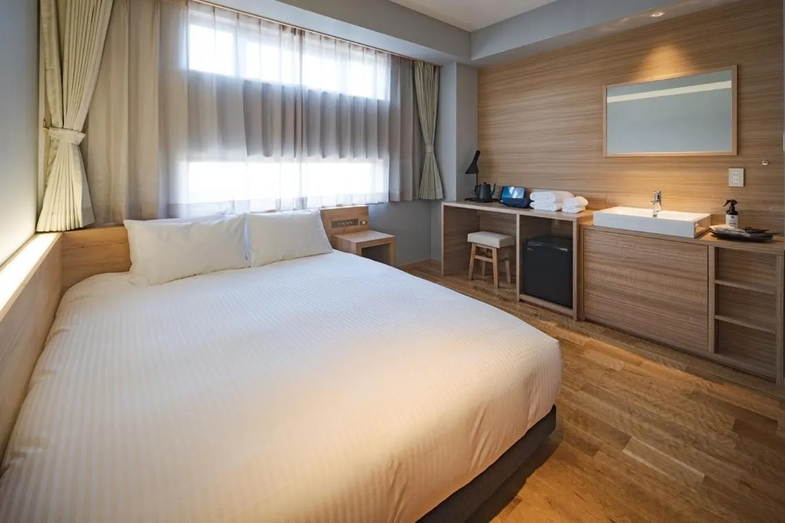 Photo of the whole room, Bed in UNO HOTEL