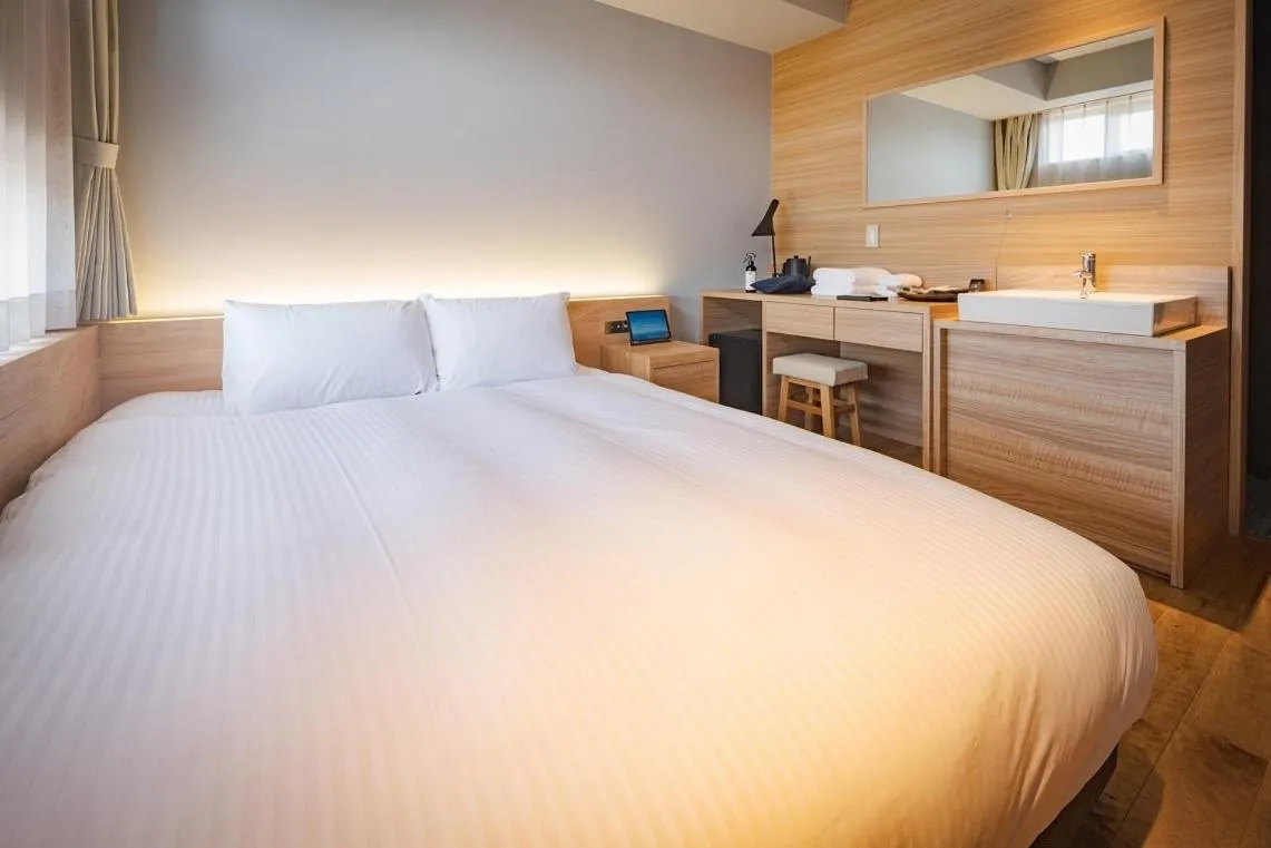 Photo of the whole room, Bed in UNO HOTEL