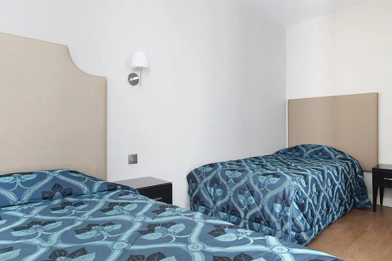 Bed in Hotel Montpensier