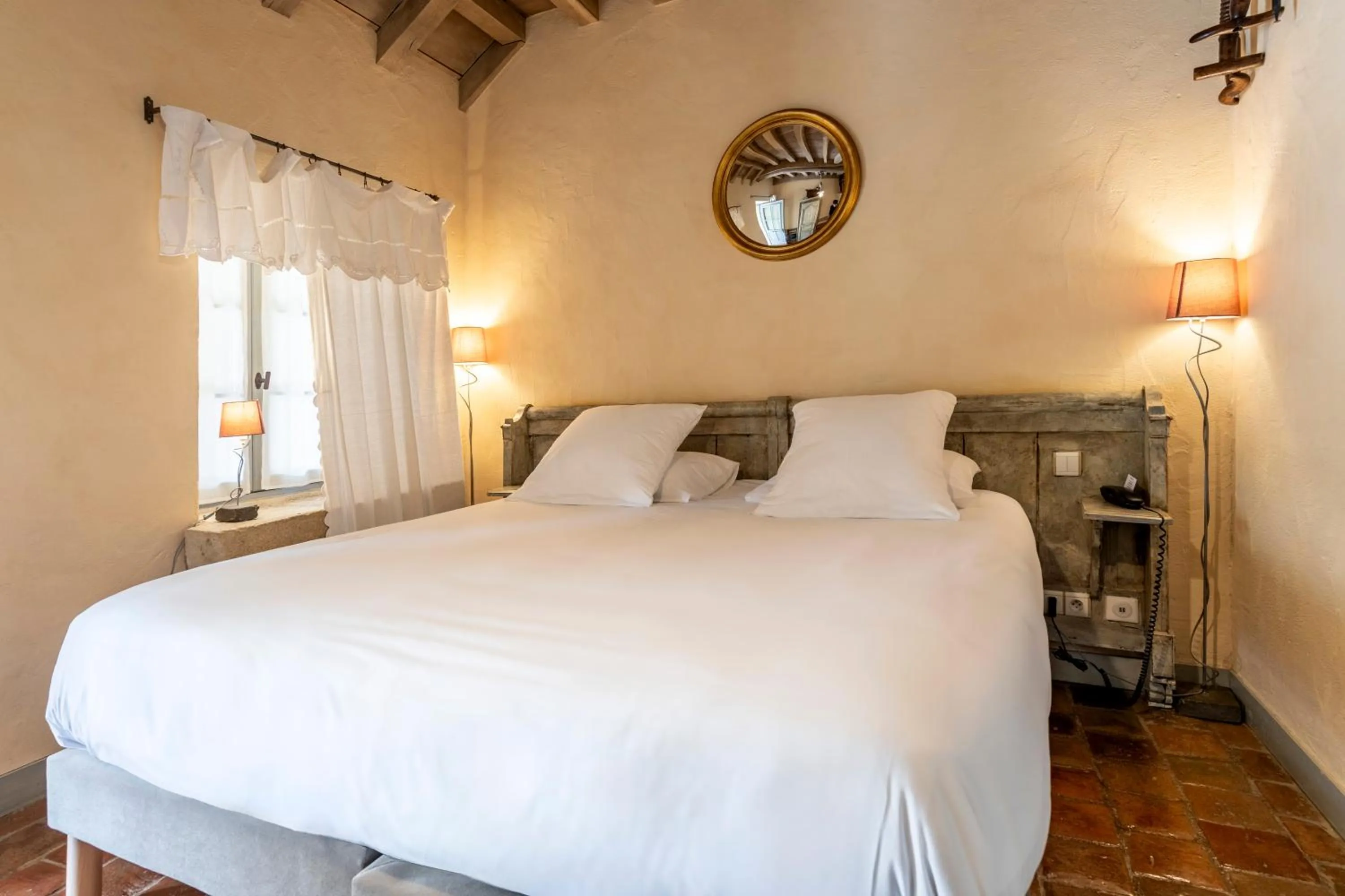 Bed in Hôtel De La Beursaudiere