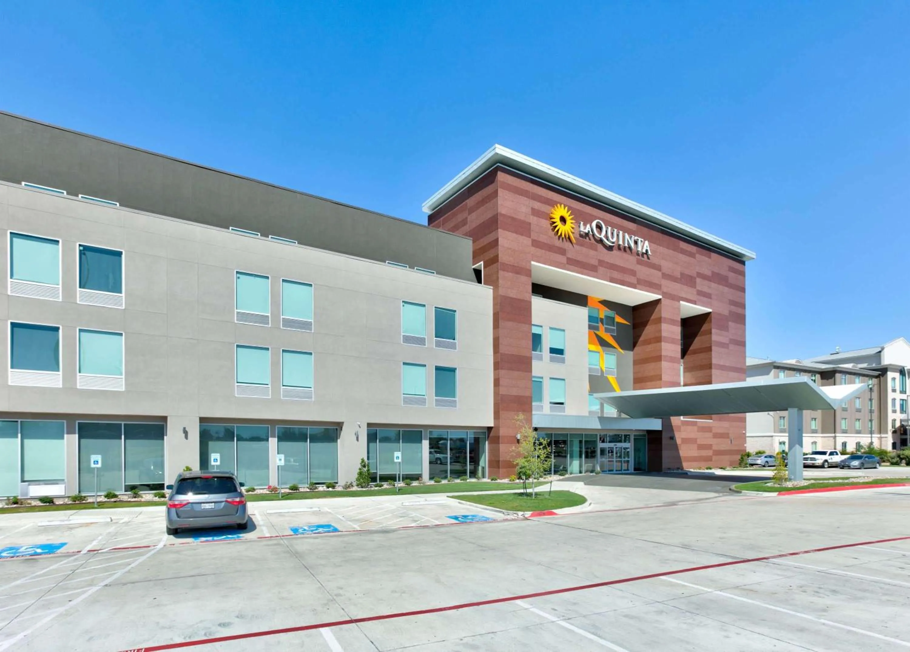 Property building in La Quinta Inn & Suites by Wyndham Dallas/Fairpark