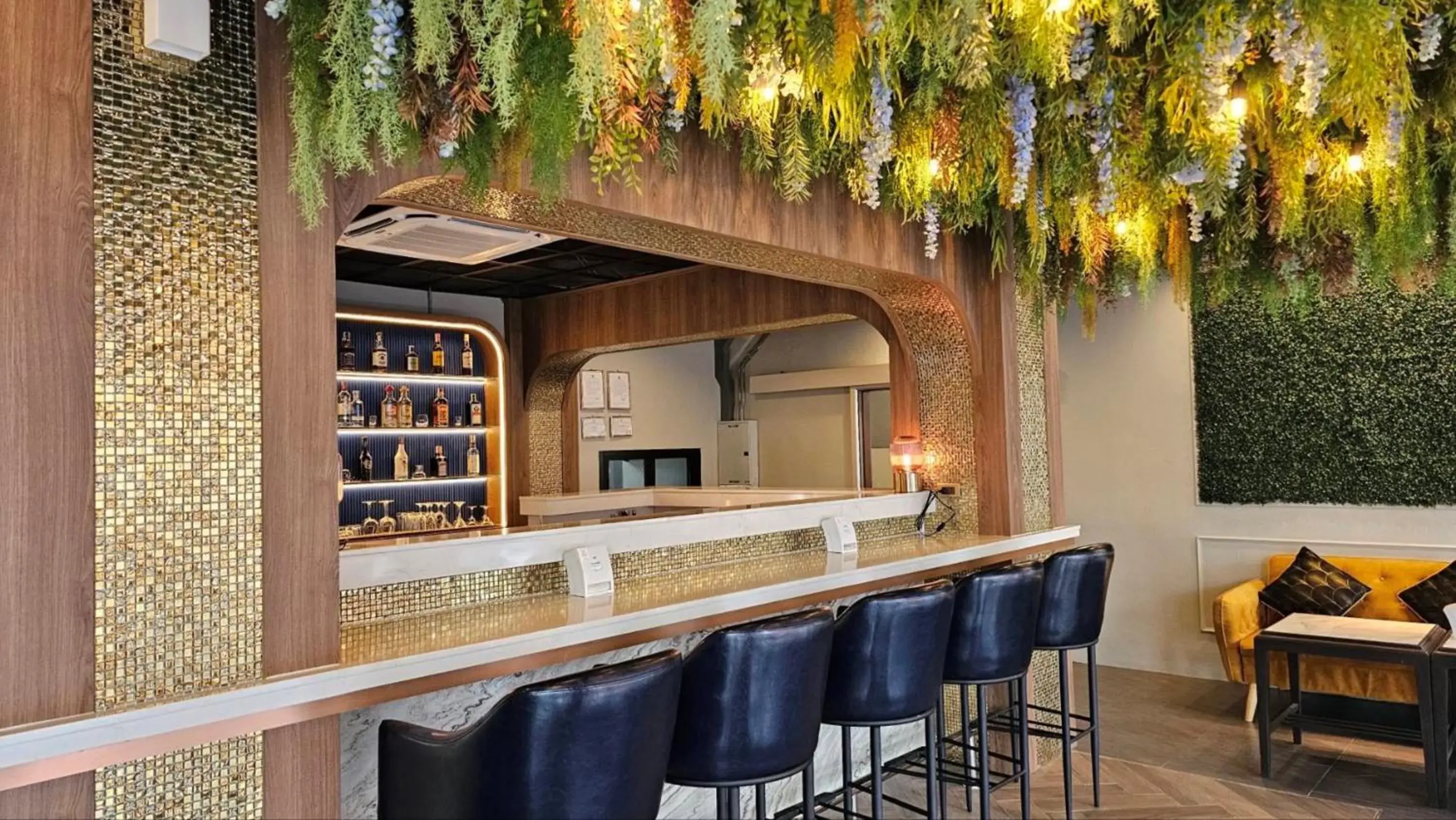 Lounge or bar in Montree Phuket Hotel Lounge or bar in Montree Phuket Hotel