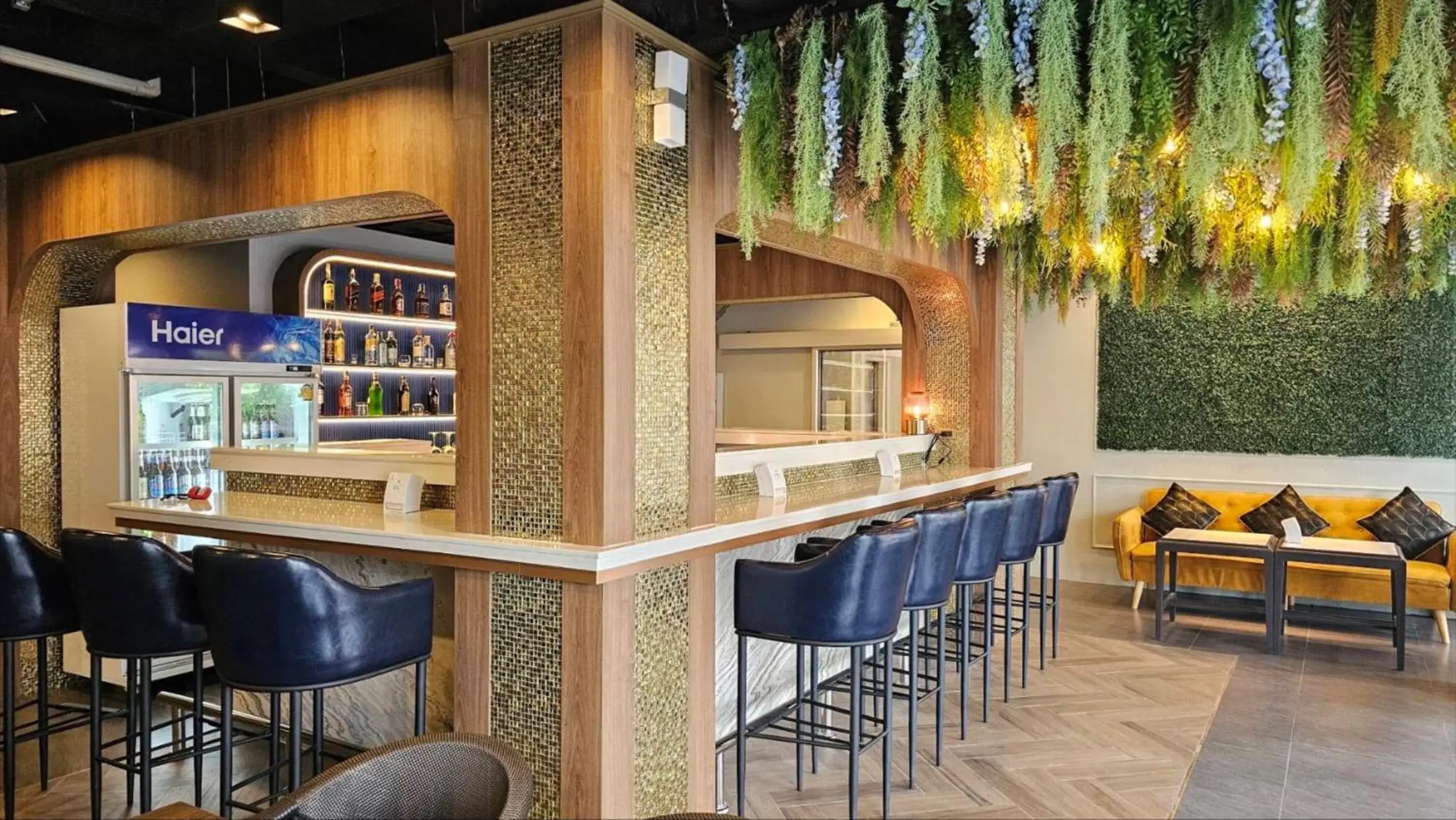 Lounge or bar in Montree Phuket Hotel Lounge or bar in Montree Phuket Hotel