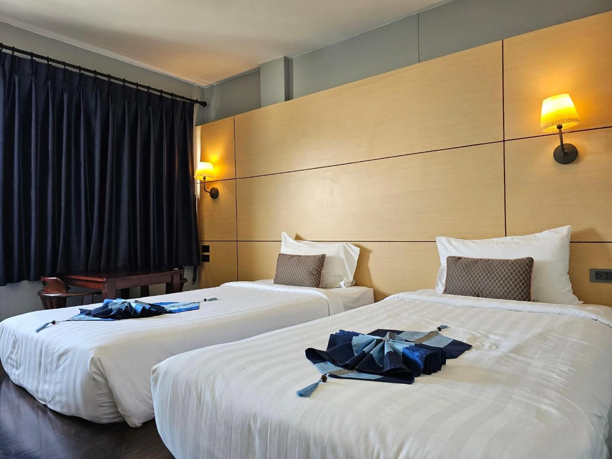 Bed in Montree Phuket Hotel