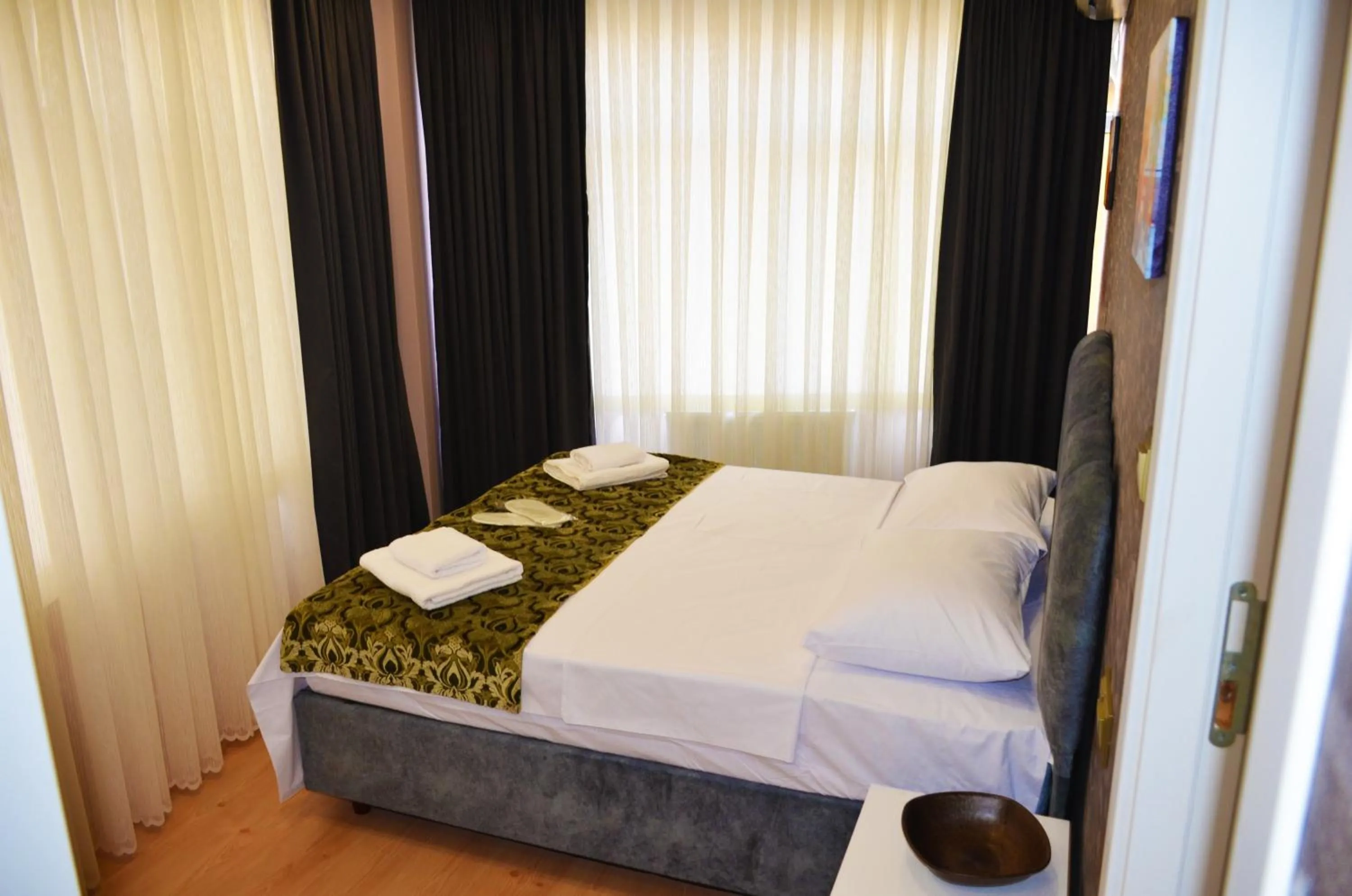 View (from property/room), Bed in Rodion Hotel