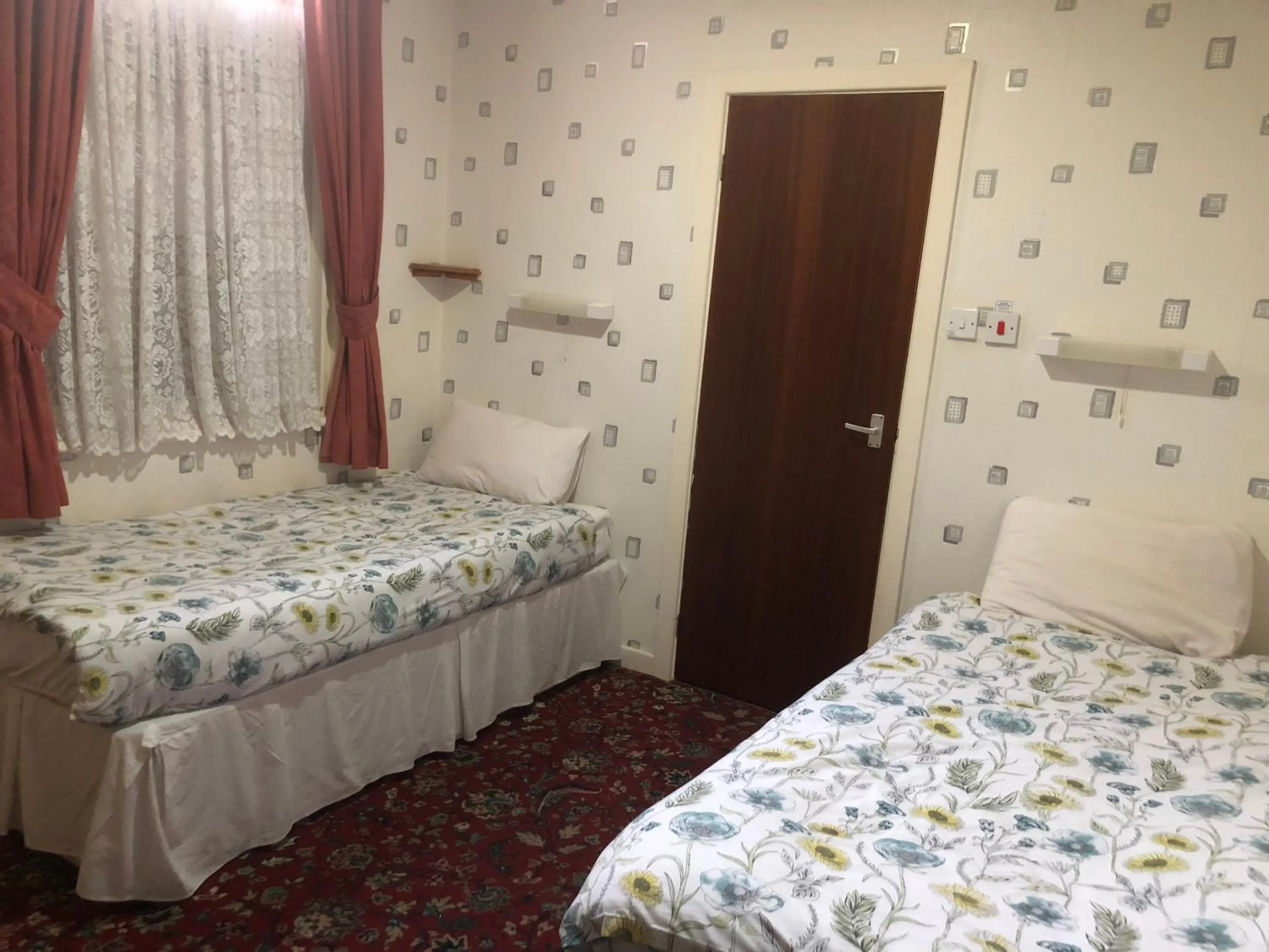 Bed in Melrose Hotel