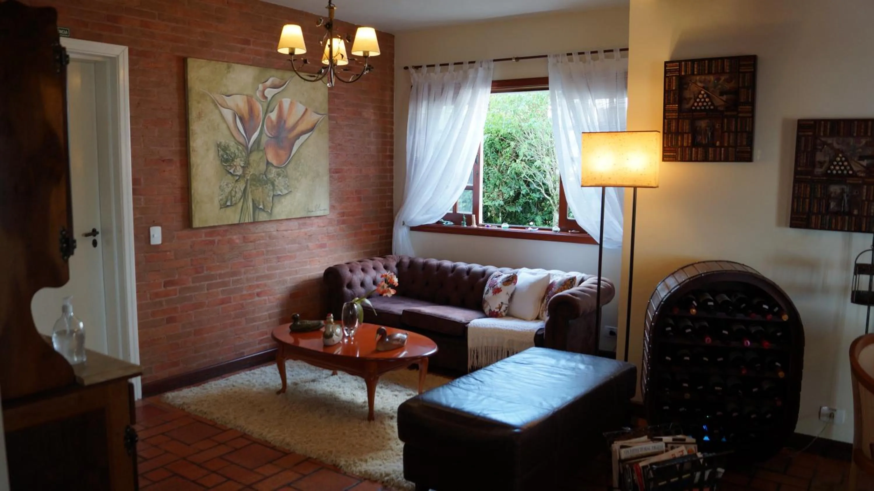 Communal lounge/ TV room in Pousada Chateau Colinas