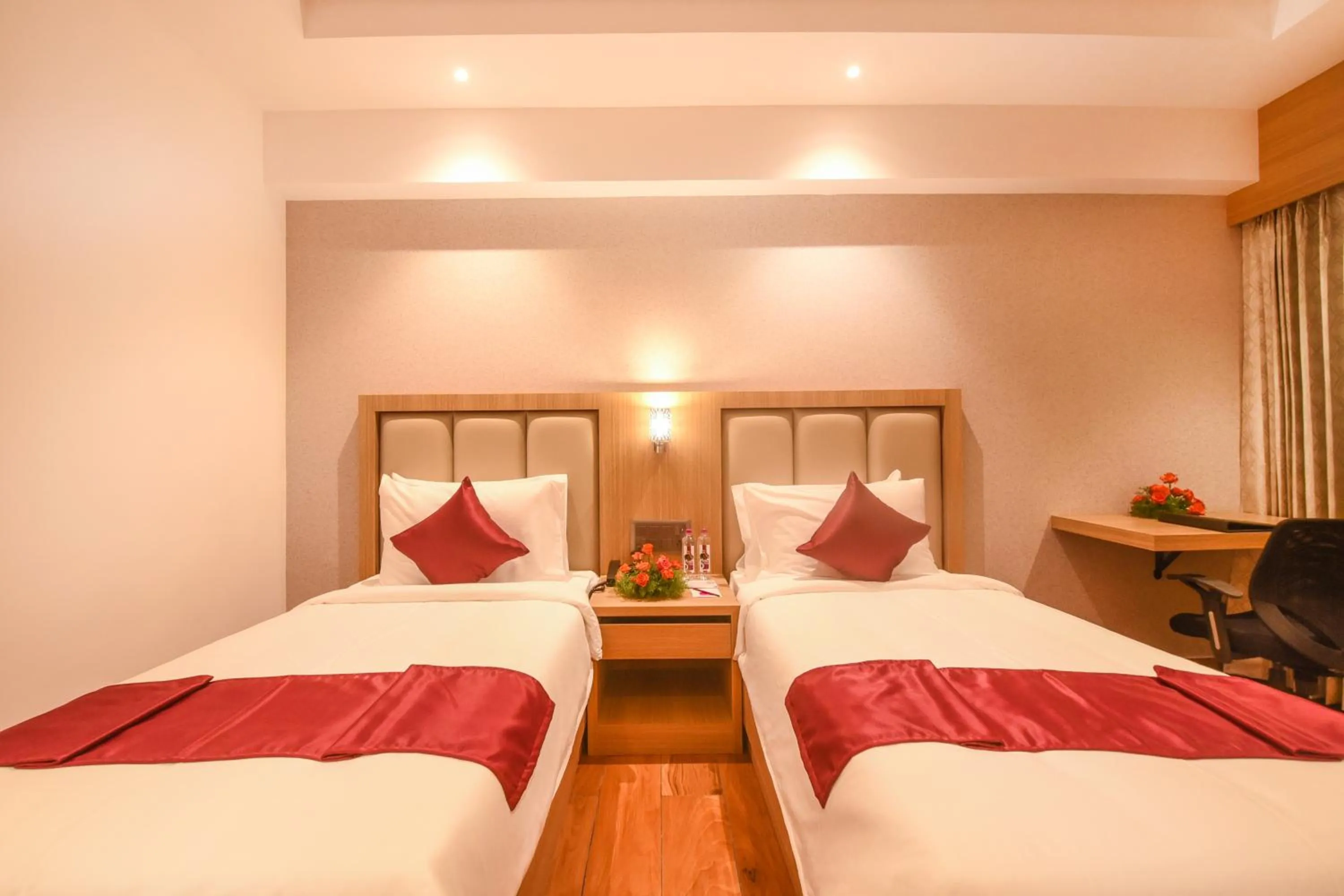 Bed in Emerald Clarks Inn Suites