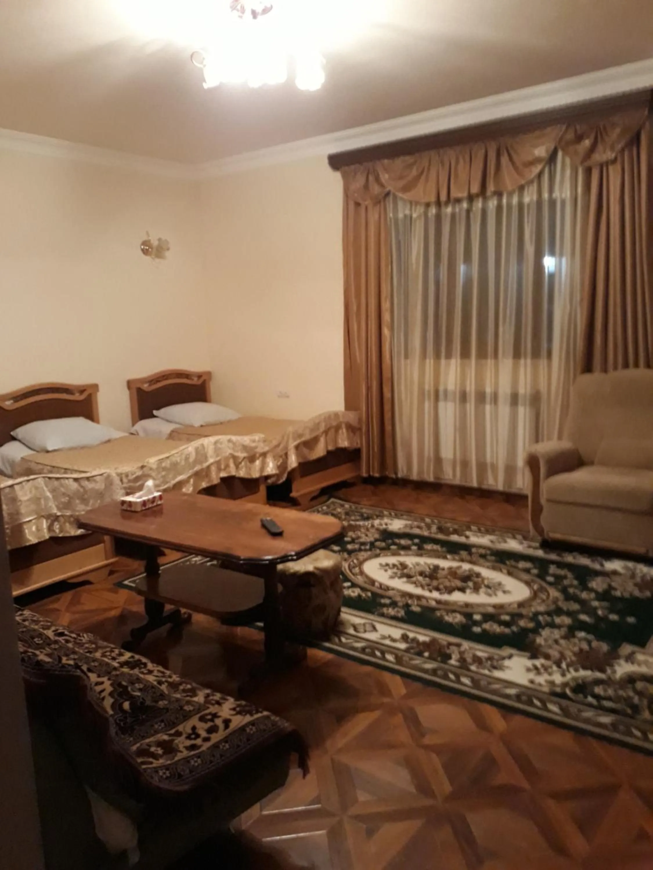 Living room, Bed in Hotel Noy