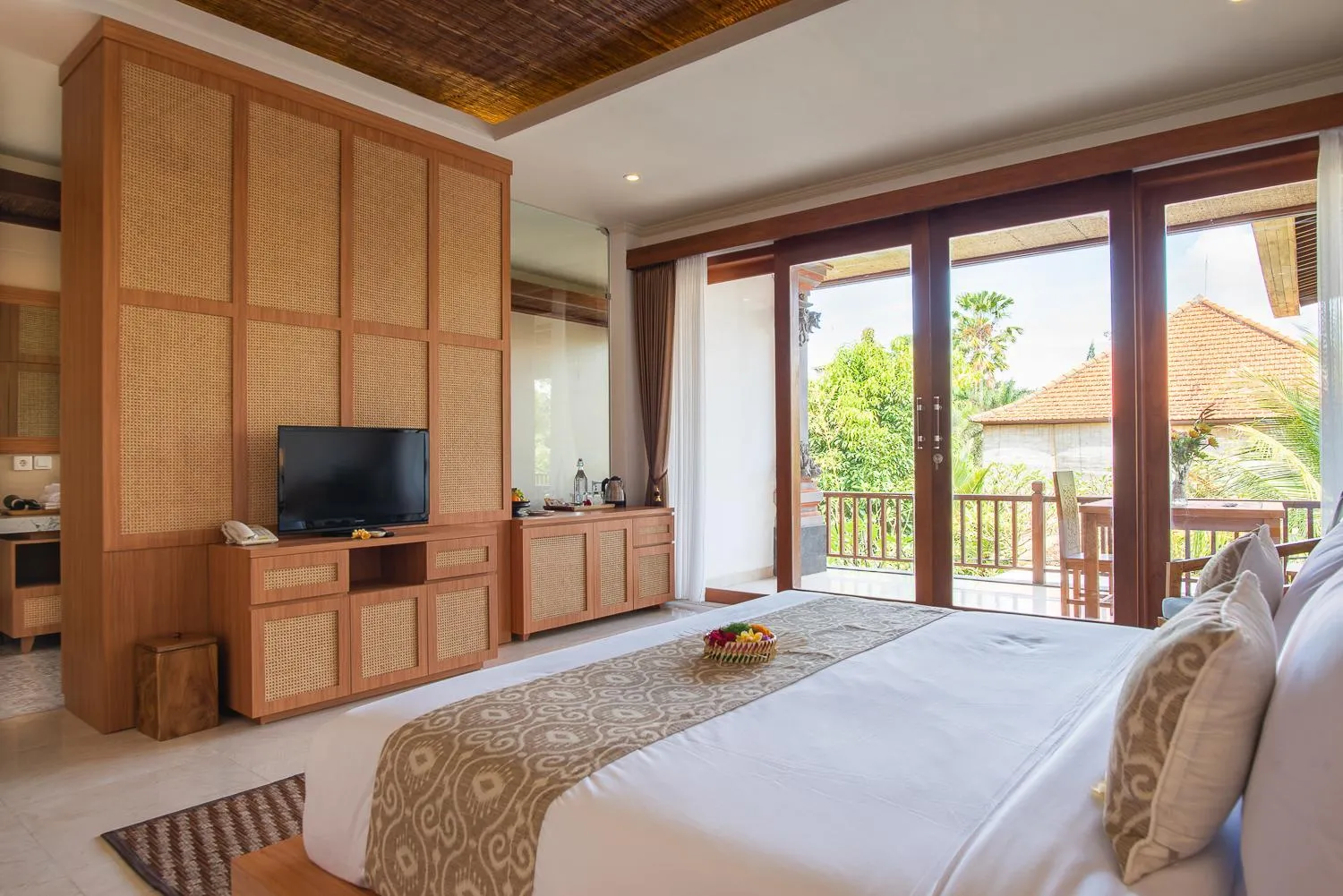 Photo of the whole room, Bed in Budhi Ayu Villas and Cottages Ubud by Mahaputra-CHSE Certified