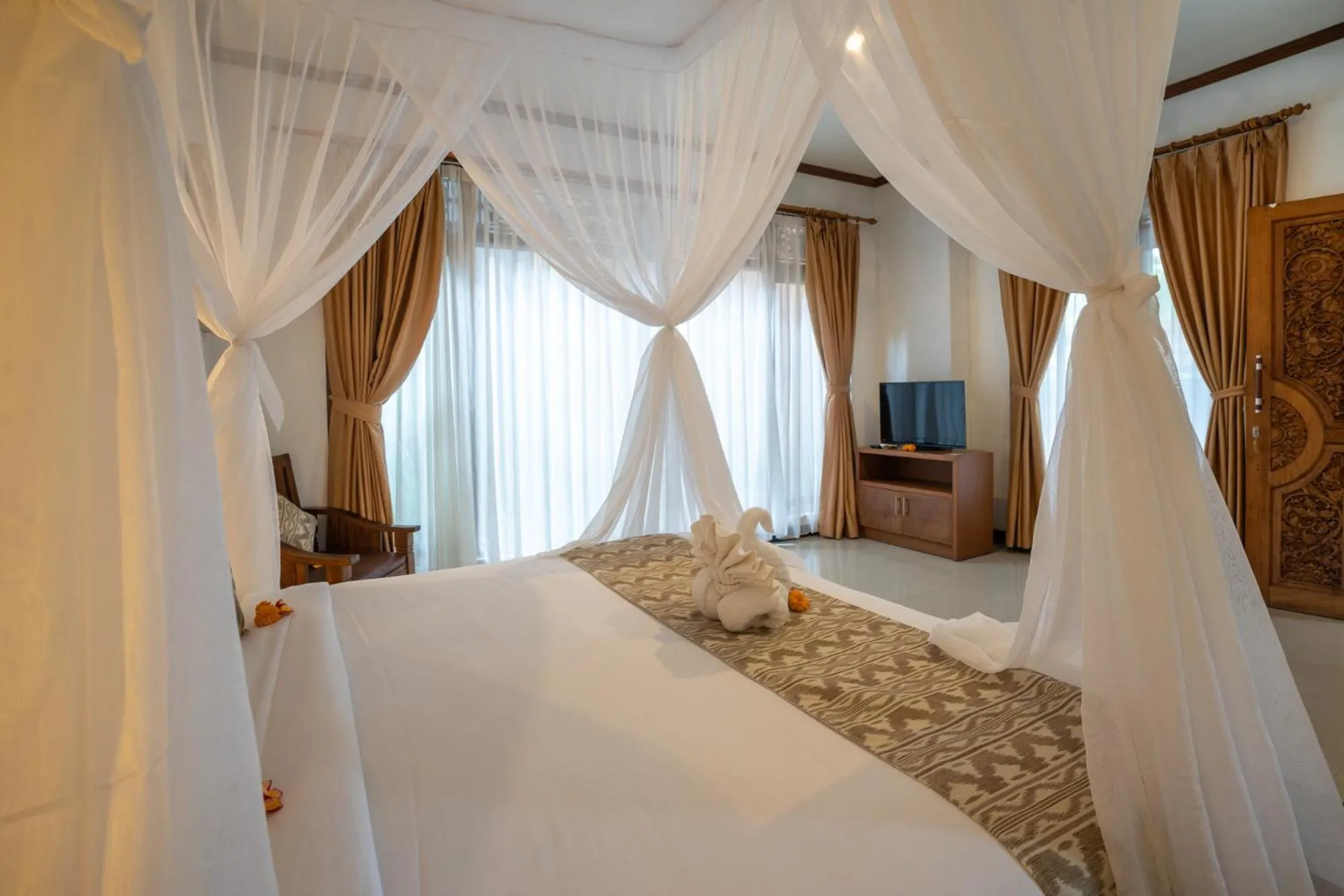 Bed in Budhi Ayu Villas and Cottages Ubud by Mahaputra-CHSE Certified