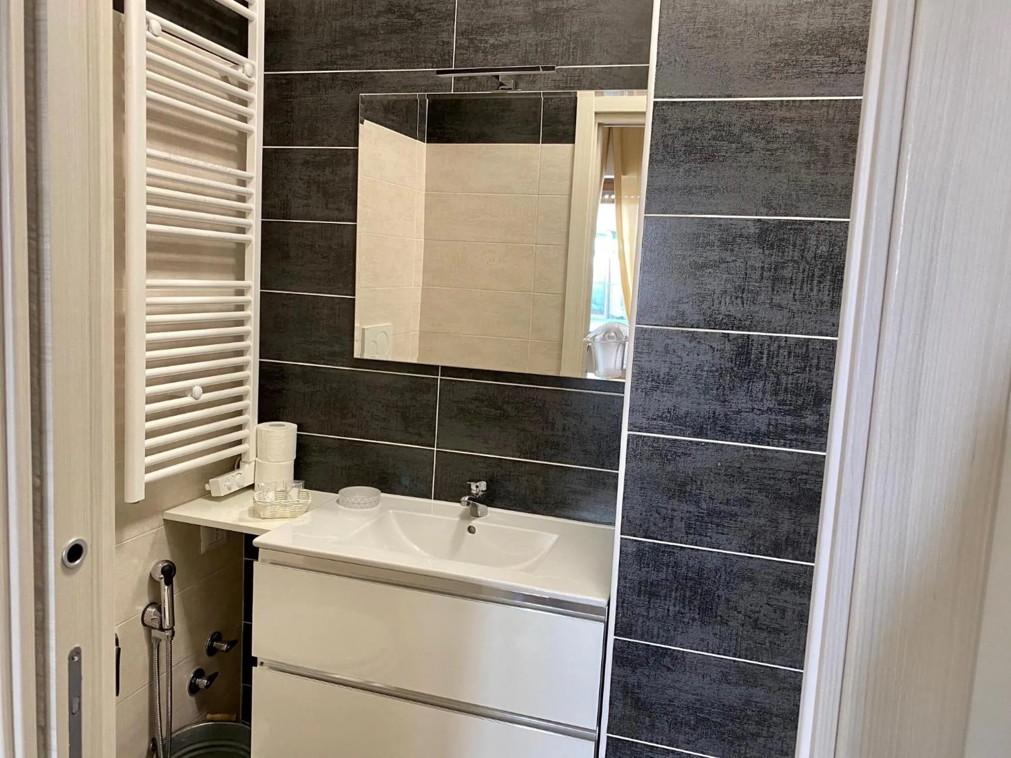 Bathroom in Caruso Rooms