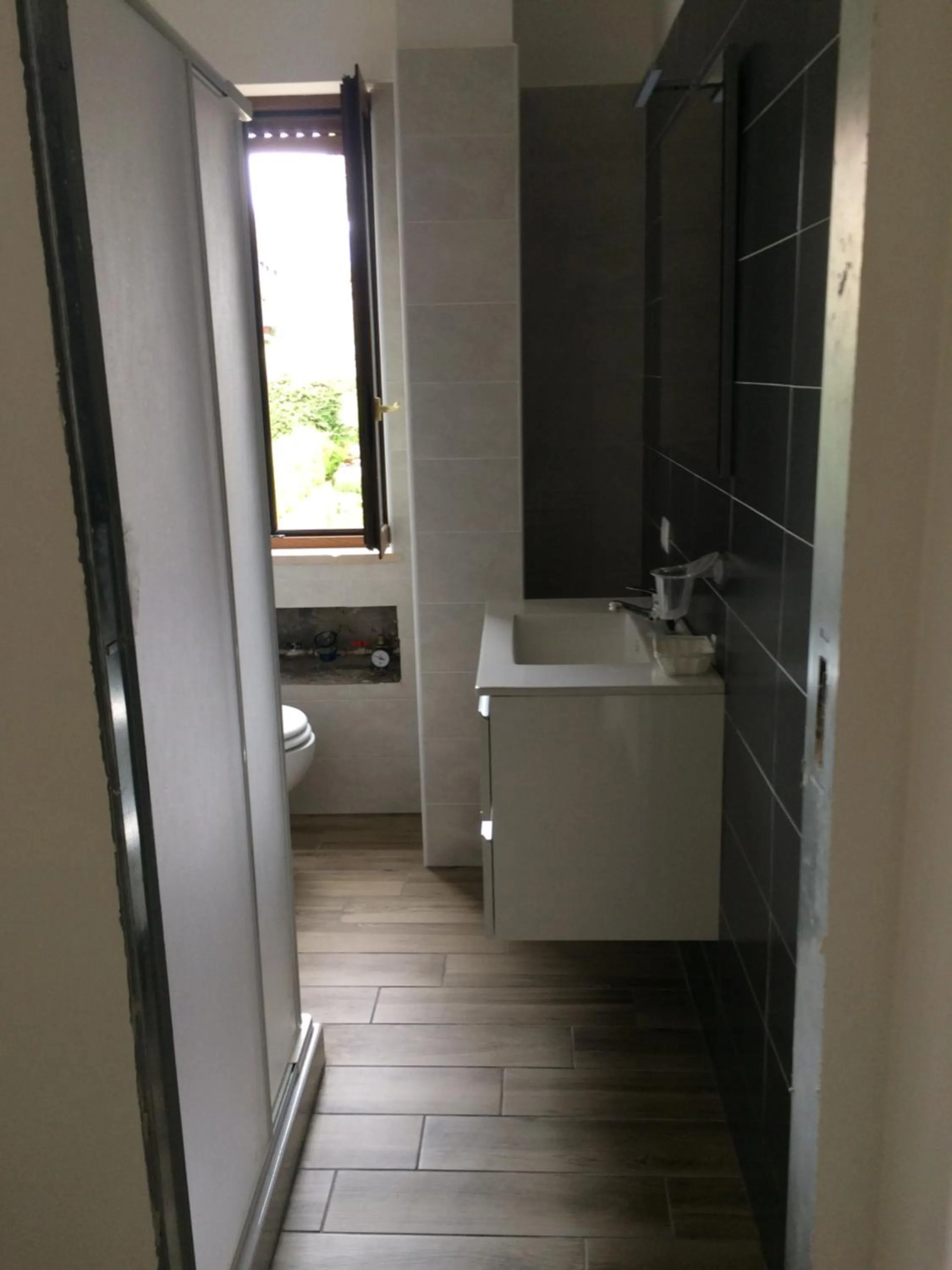 Bathroom in Caruso Rooms