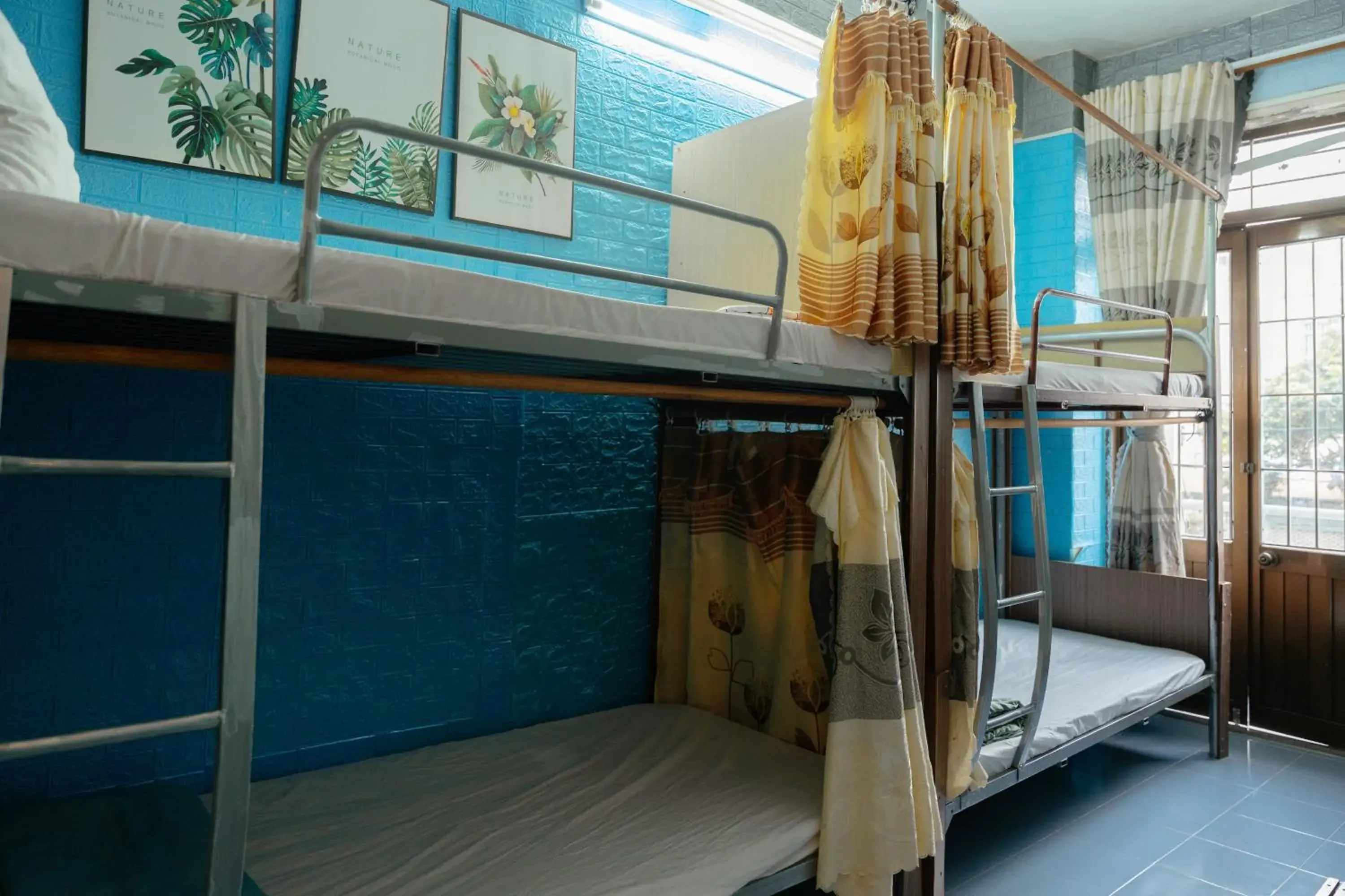 Bed in 4-Bed Mixed Dormitory Room in Bụi Hostel - Ferry to Rạch Giá Bed in 4-Bed Mixed Dormitory Room in Bụi Hostel - Ferry to Rạch Giá