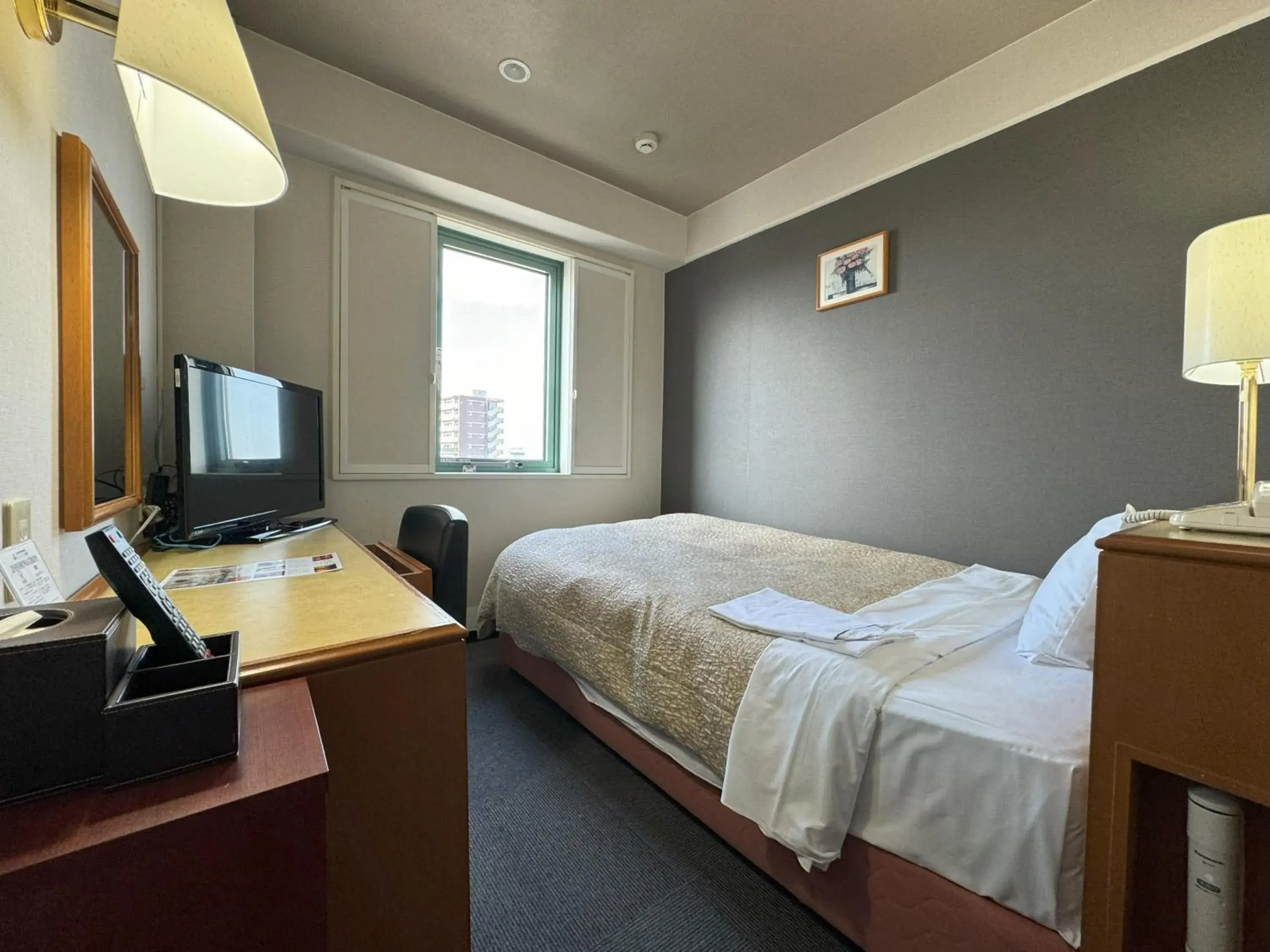 Bed in Ace Inn Matsusaka Bed in Ace Inn Matsusaka