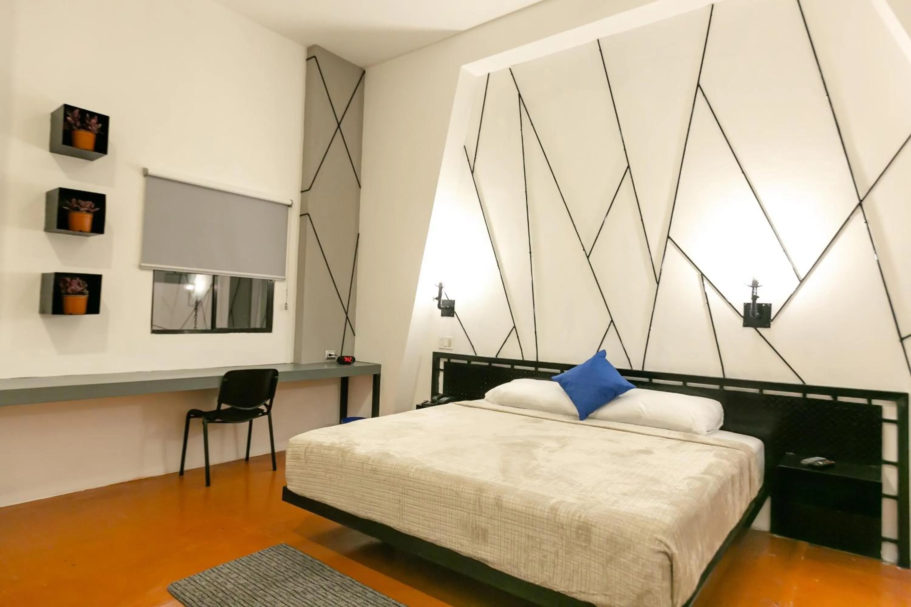 Bed in D' LA TORRE HOTEL