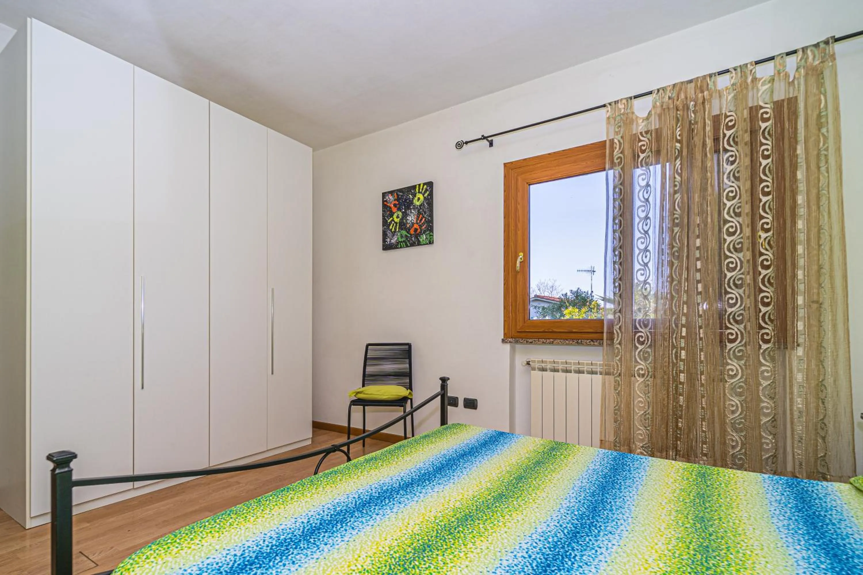 Bed in Master apartment in villa 6 to 8 persons with large private garden