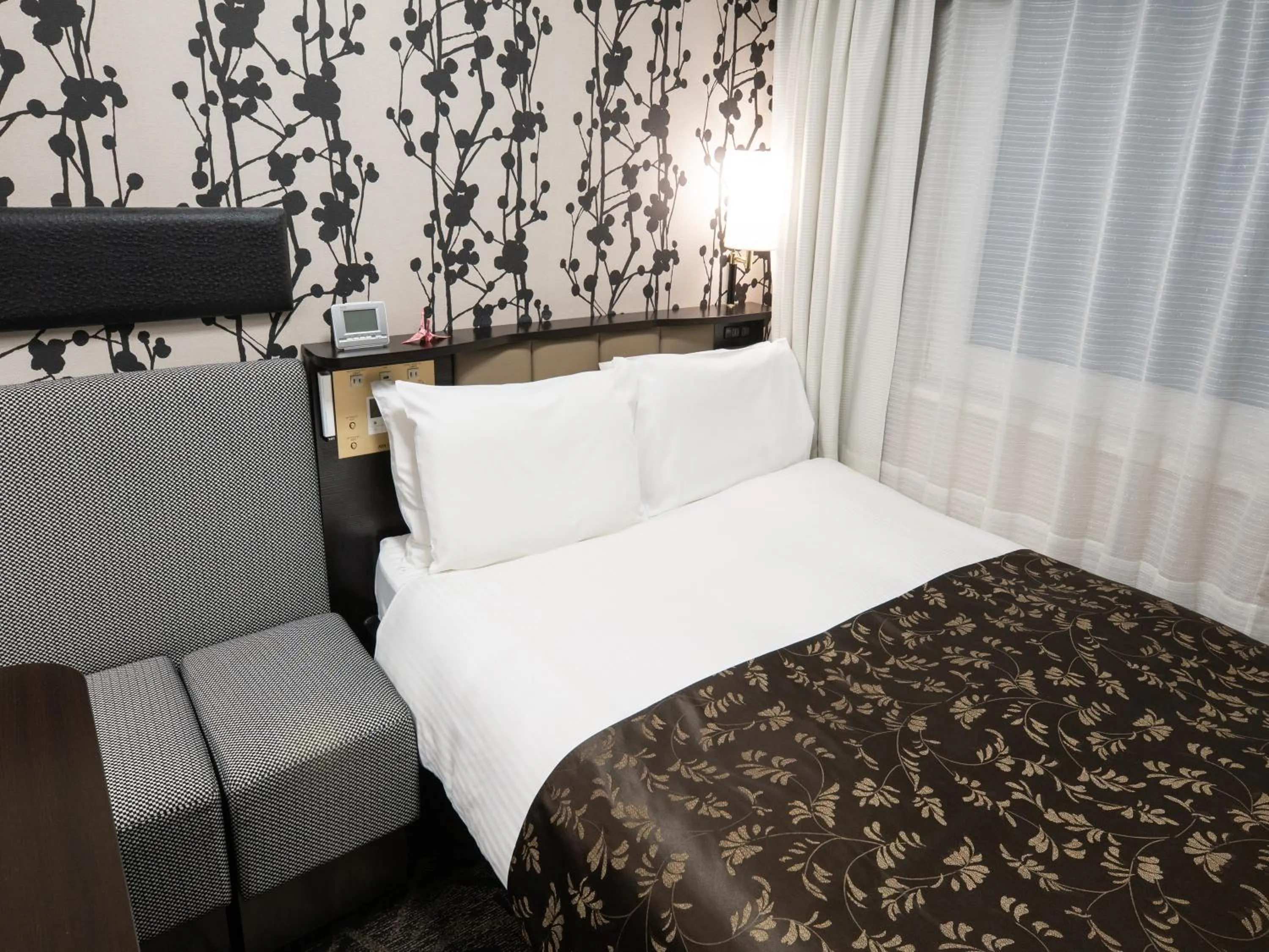 Bed in APA Hotel Shinagawa Togoshi Ekimae