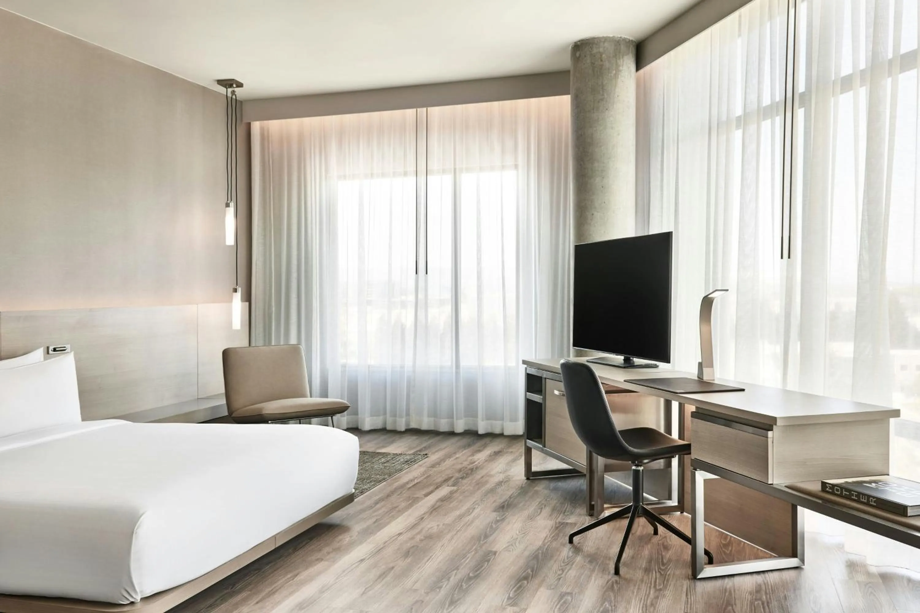 Photo of the whole room, Bed in AC Hotel by Marriott Sunnyvale Moffett Park