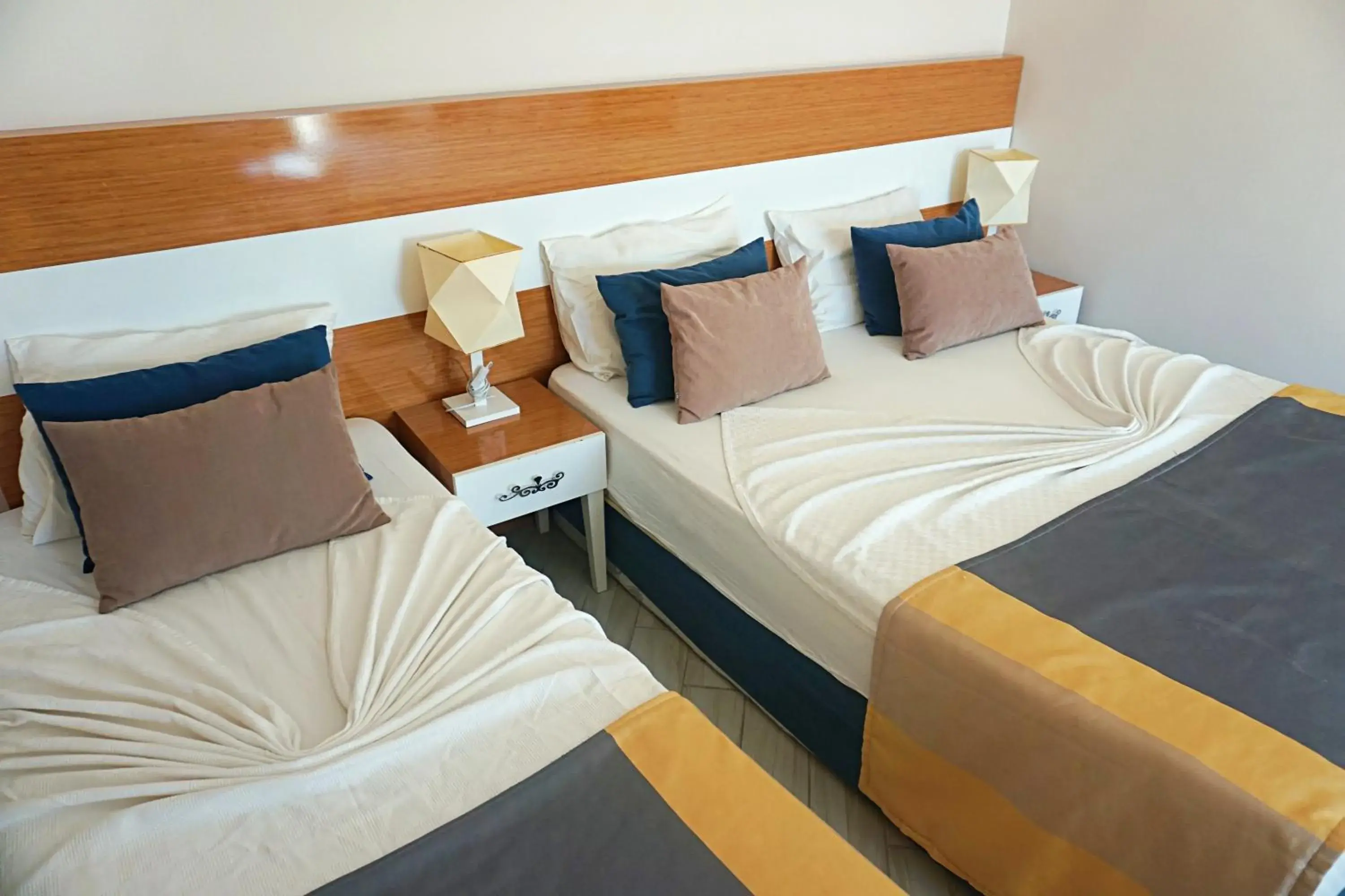 Bed in Side Legend Hotel 