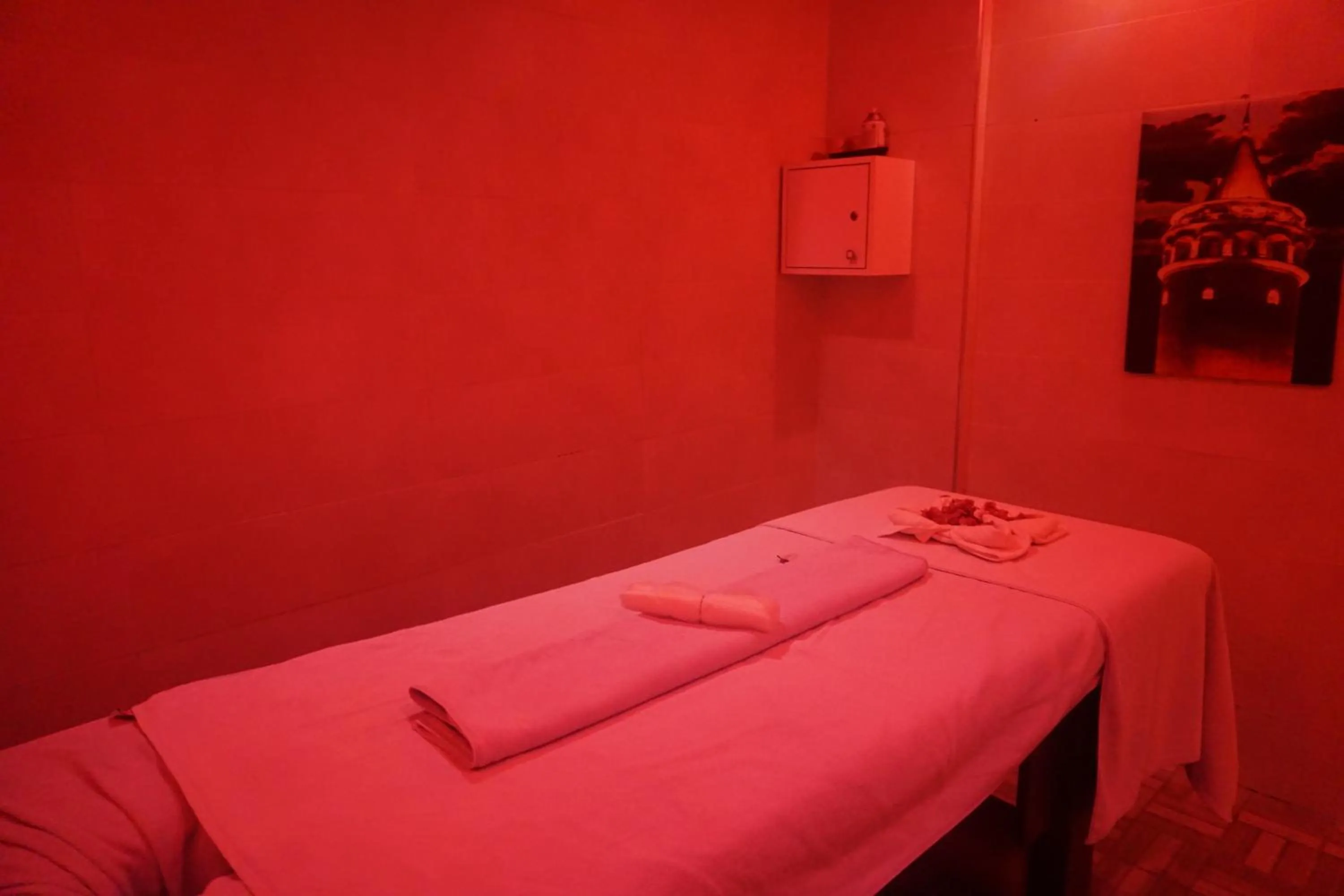 Bed in Side Legend Hotel