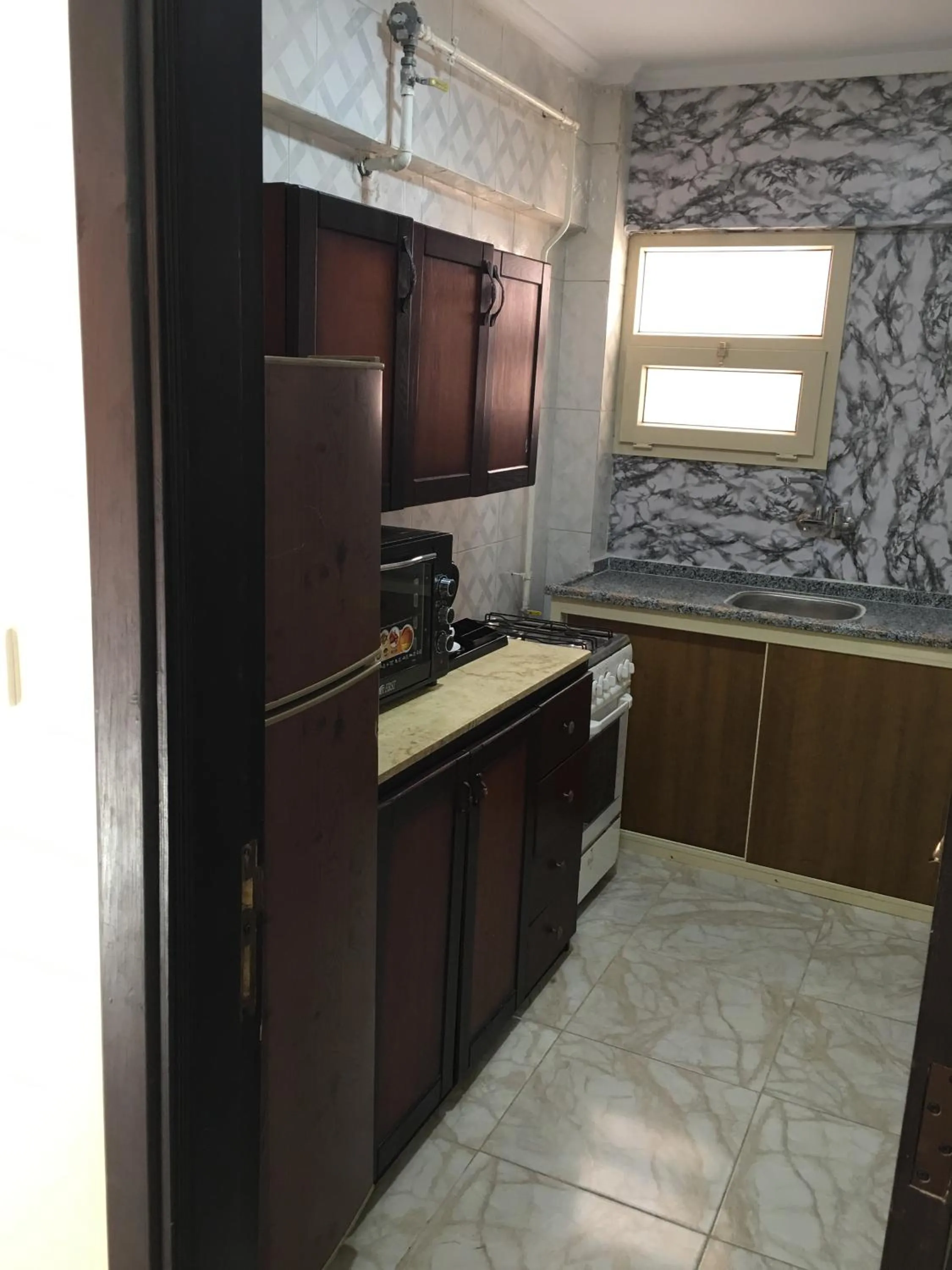 Kitchen or kitchenette in Jewel Gameel appartement