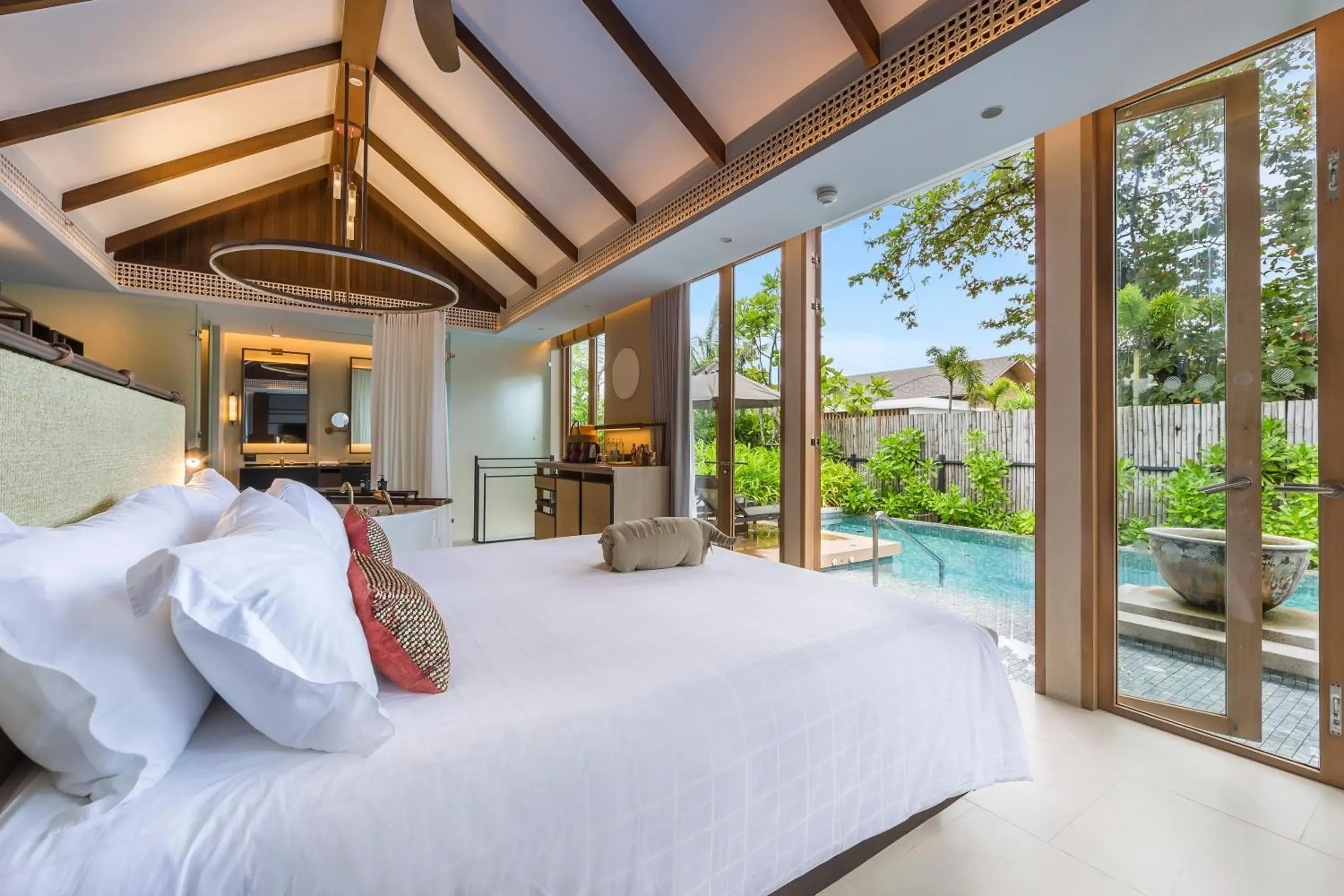 Pool view, Bed in Pullman Khao Lak Resort Pool view, Bed in Pullman Khao Lak Resort