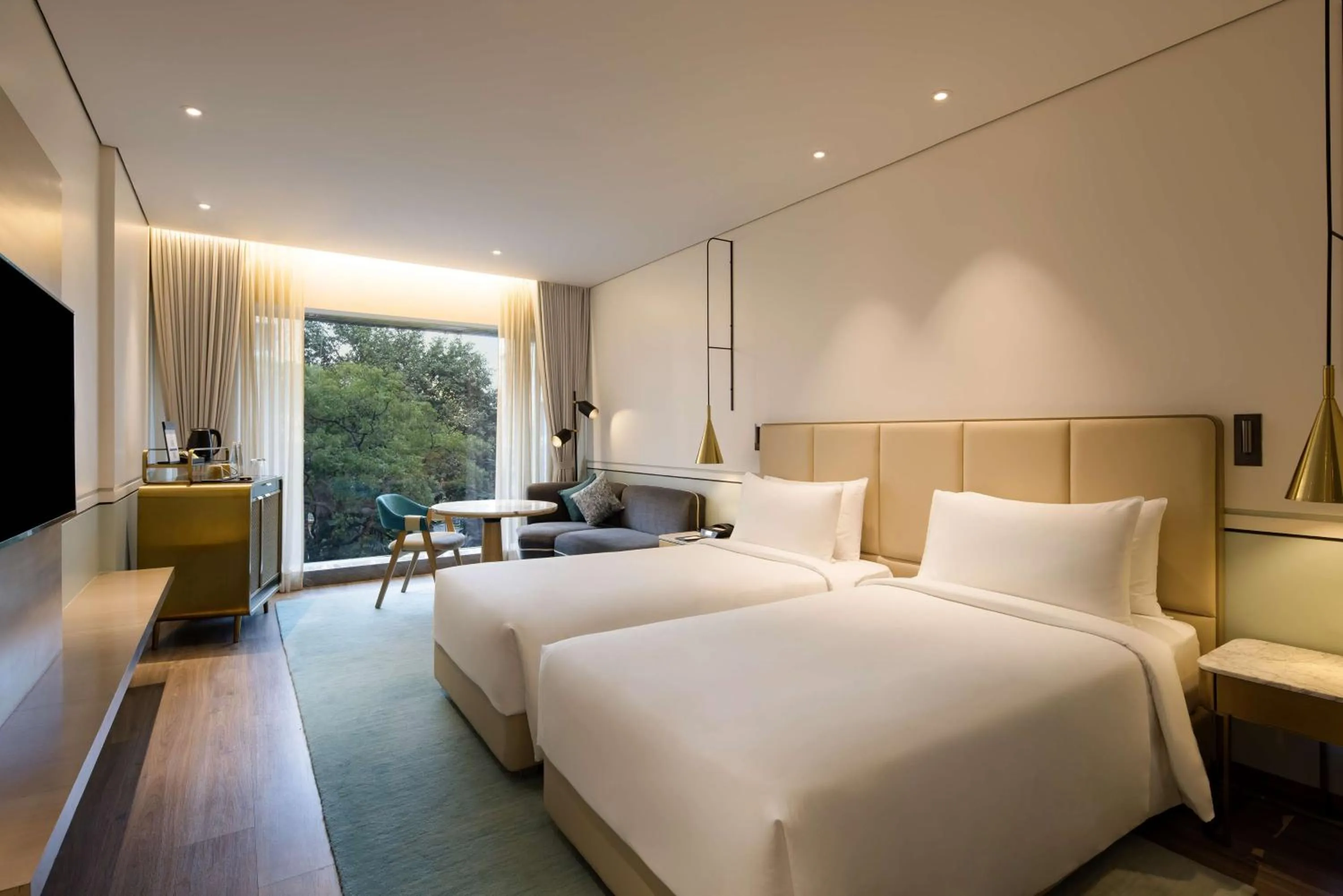 Photo of the whole room, Bed in Radisson Blu Mumbai International Airport