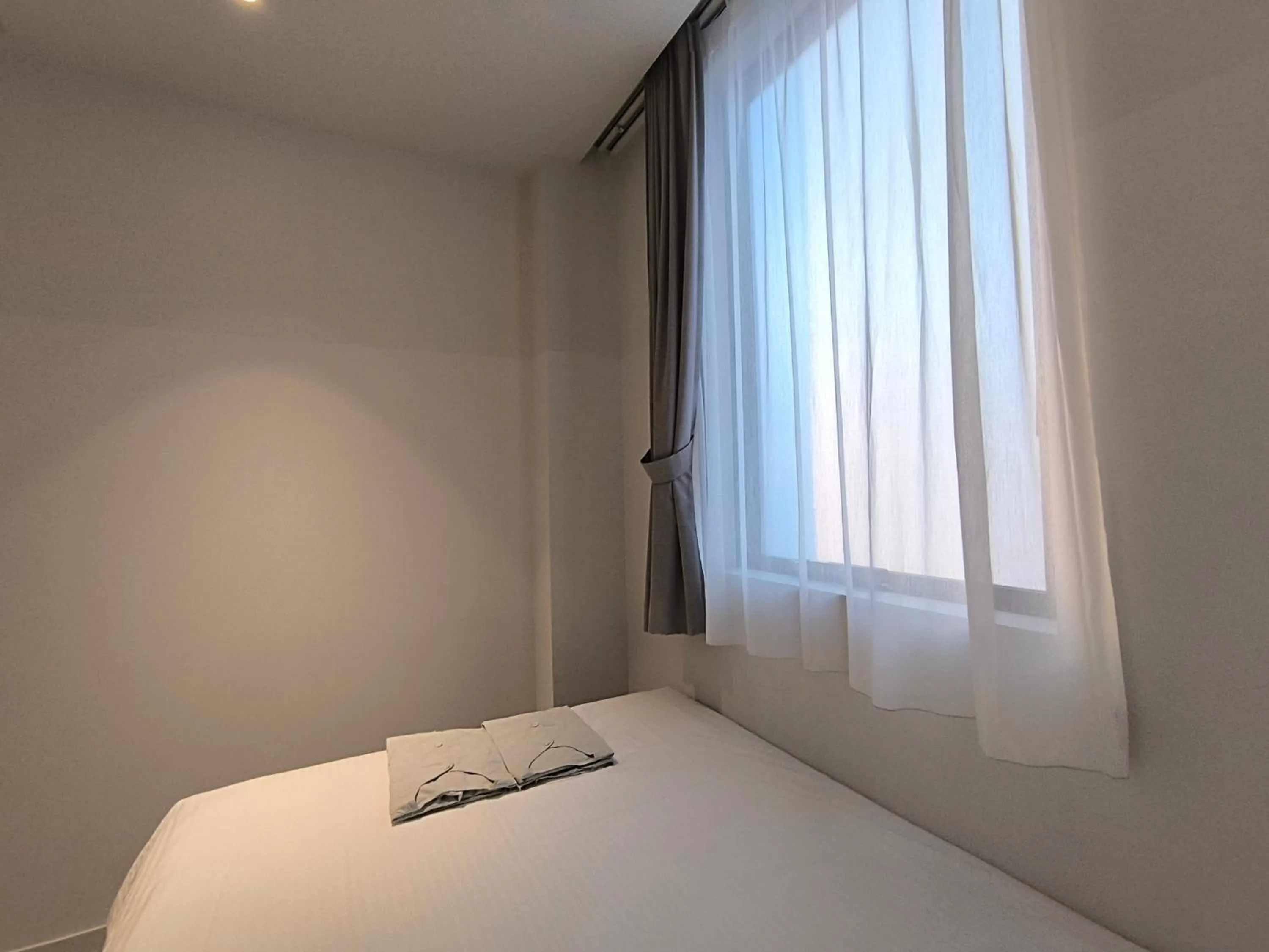 Bed in MUSTARD HOTEL SHIMOKITAZAWA