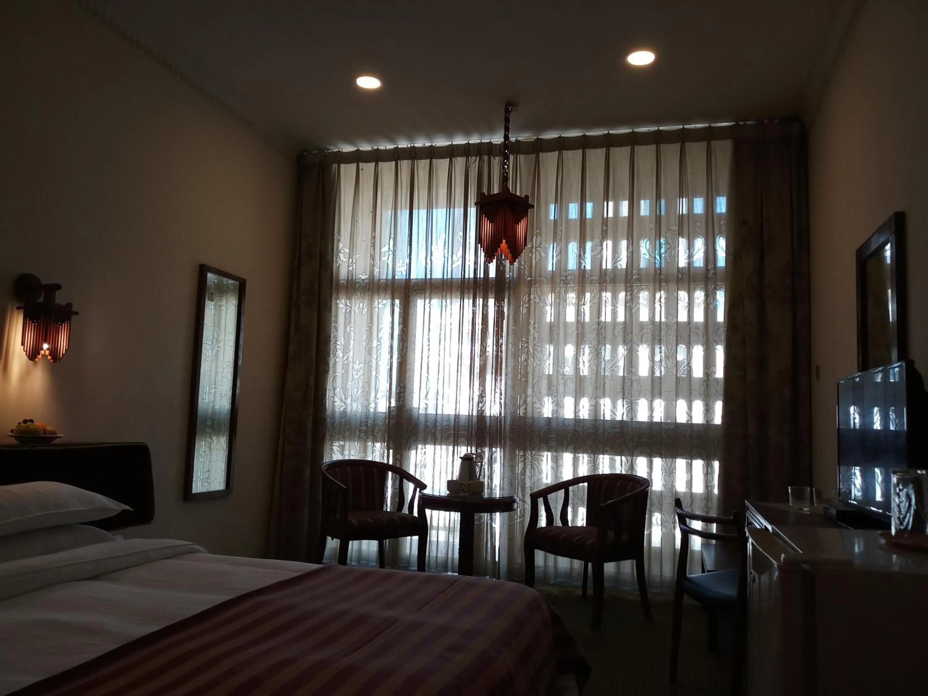 Photo of the whole room, Bed in Oriental Palace Hotel