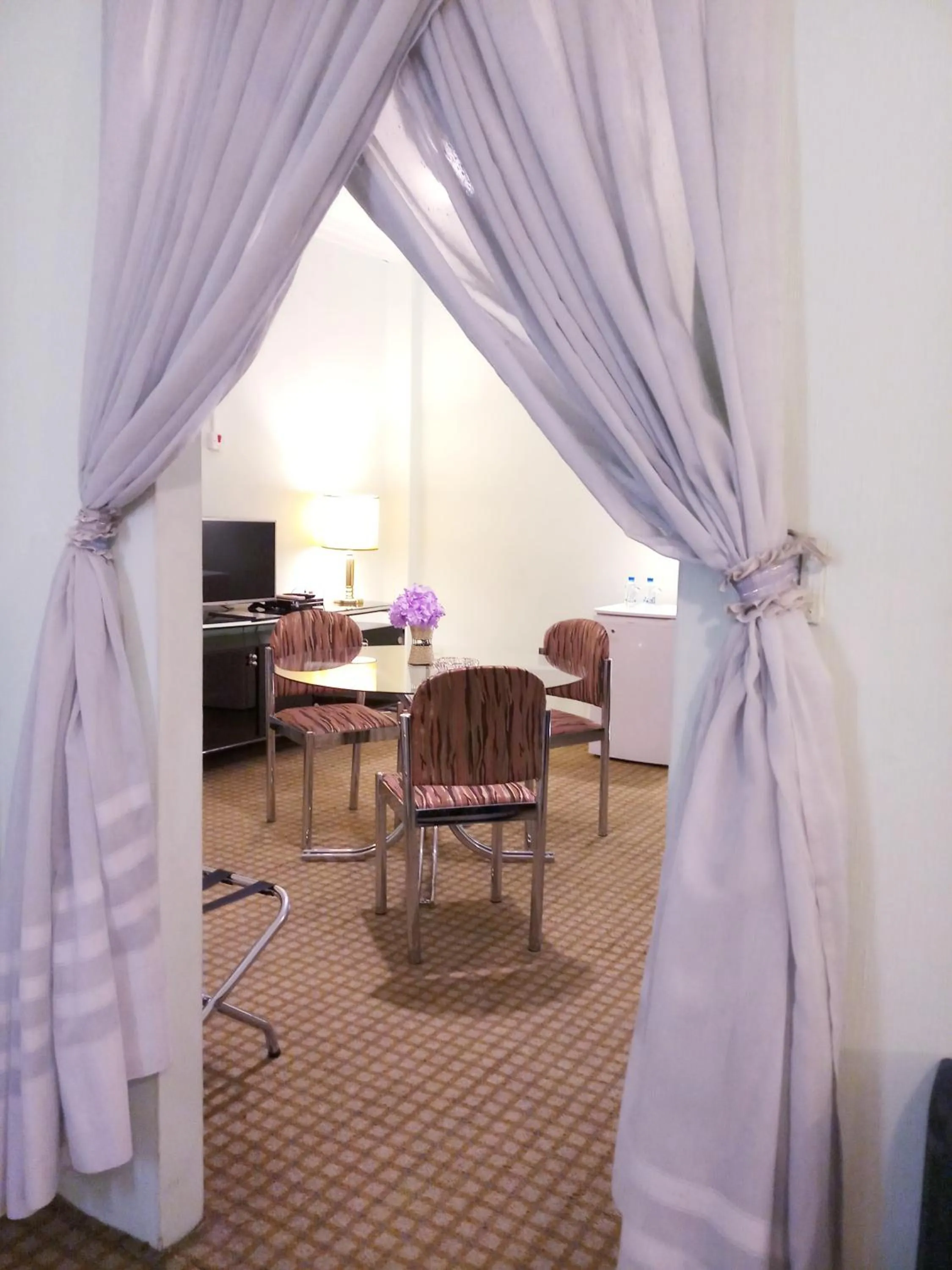 Living room in Oriental Palace Hotel