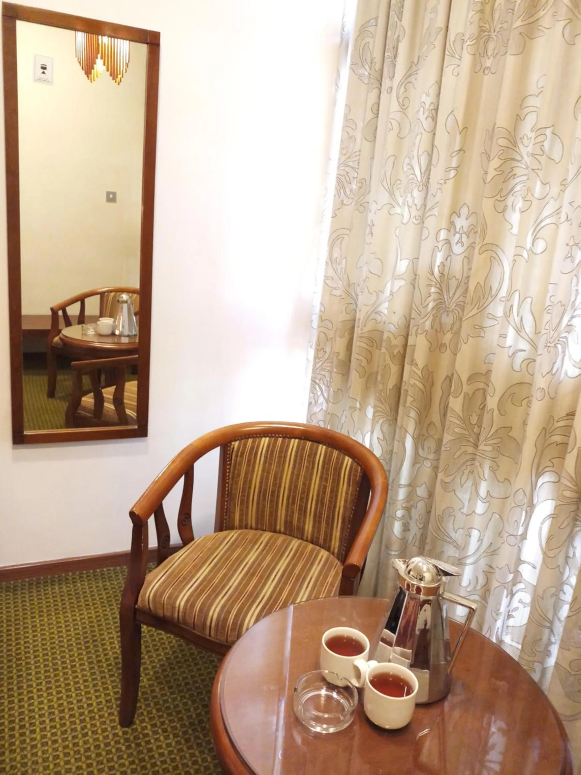 Seating area in Oriental Palace Hotel