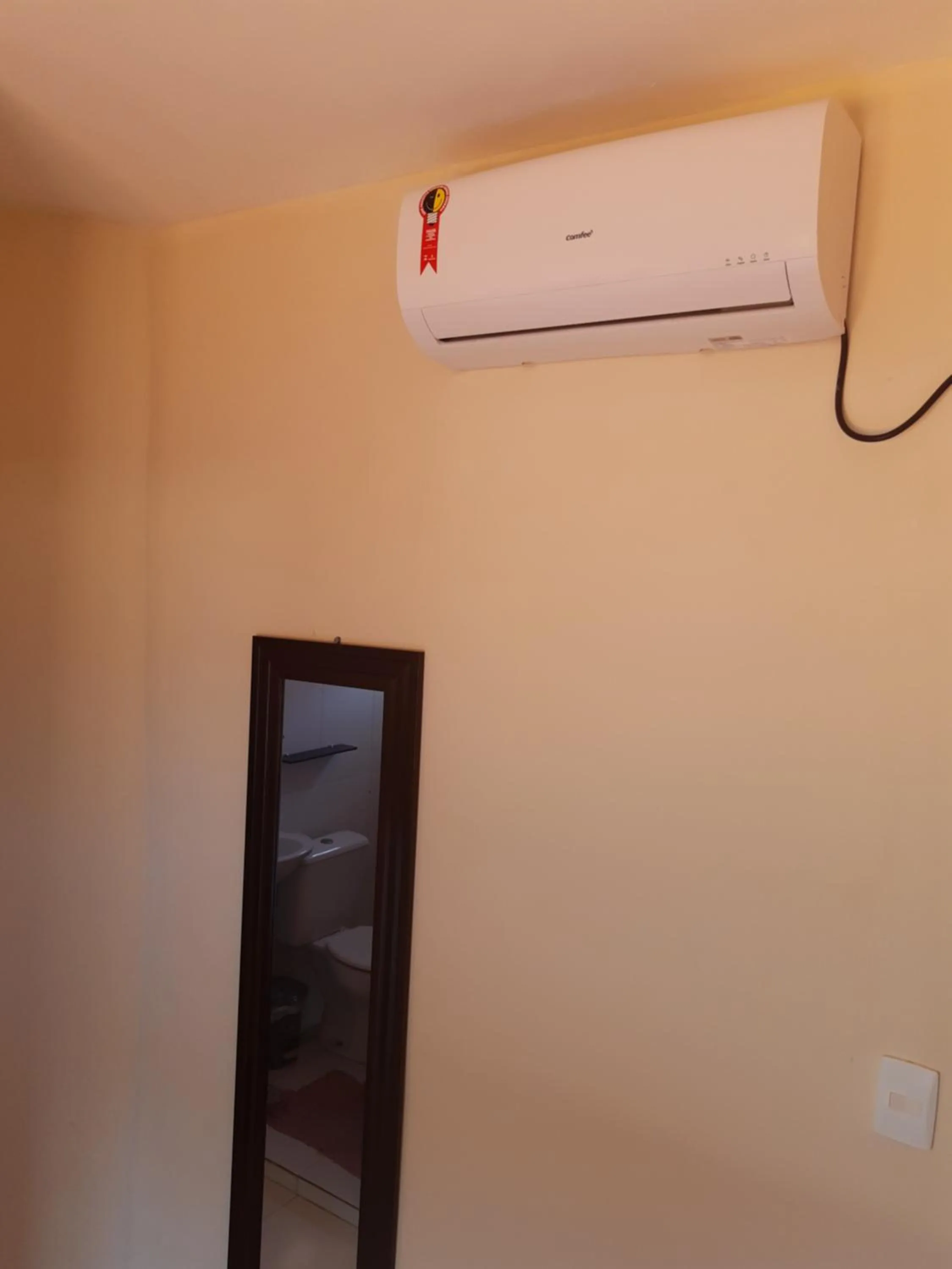 air conditioner in Suítes em Porto de Galinhas