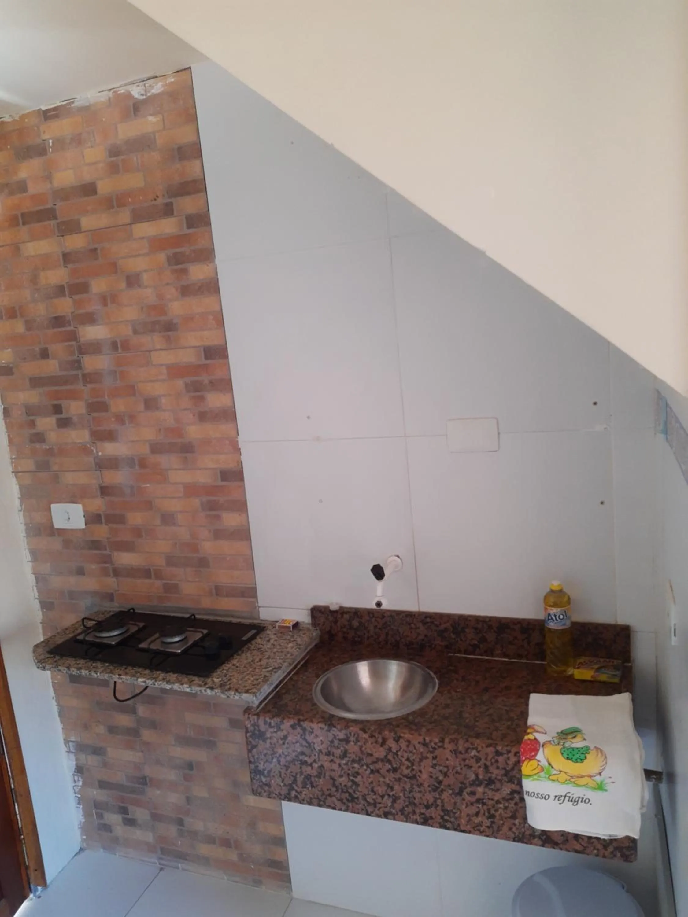 Kitchen or kitchenette in Suítes em Porto de Galinhas