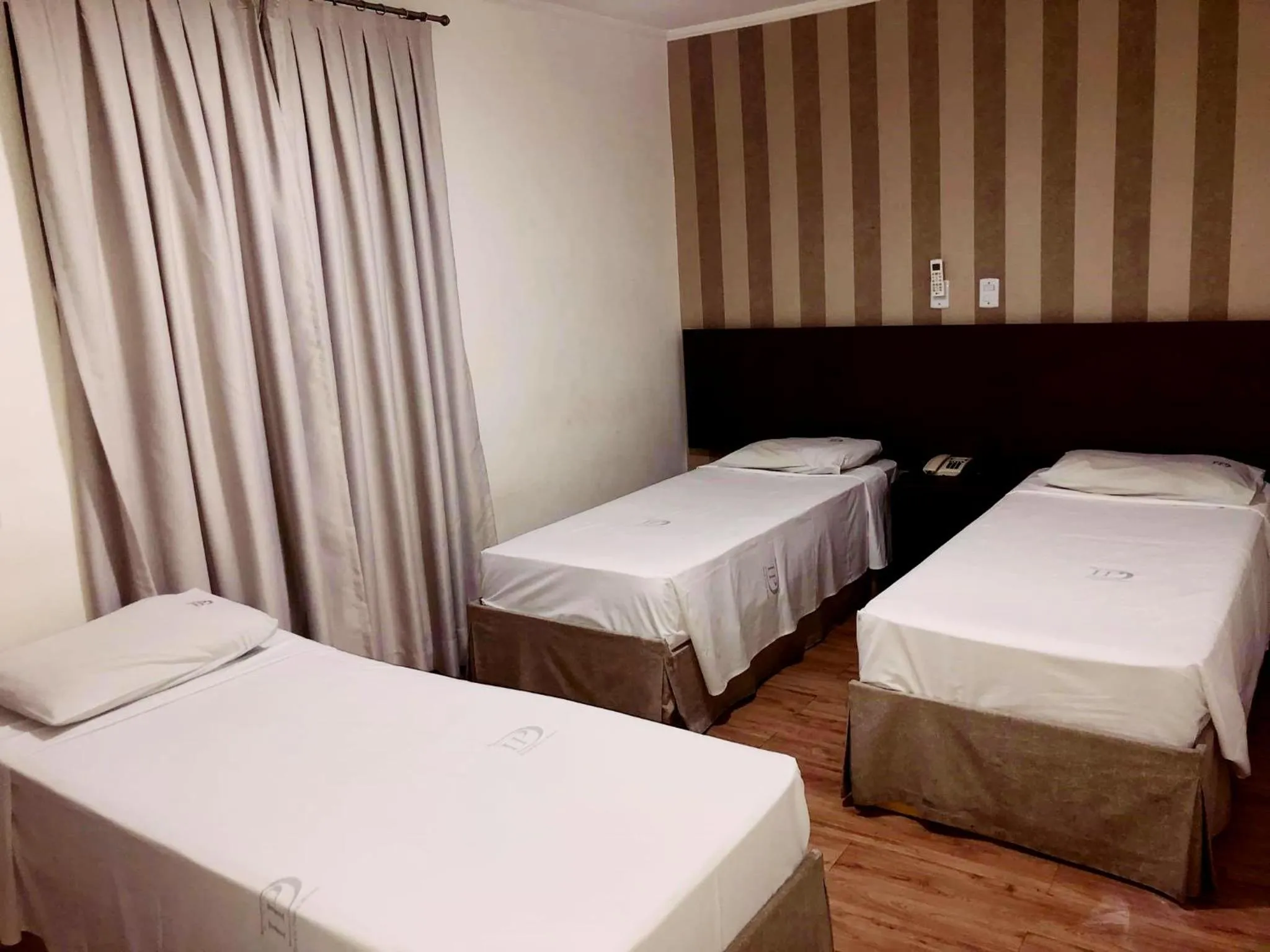 Photo of the whole room, Bed in David Plaza Hotel