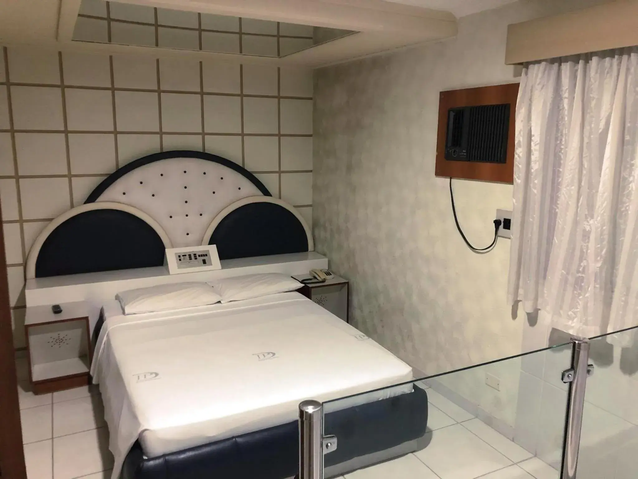 Bed in David Plaza Hotel Bed in David Plaza Hotel