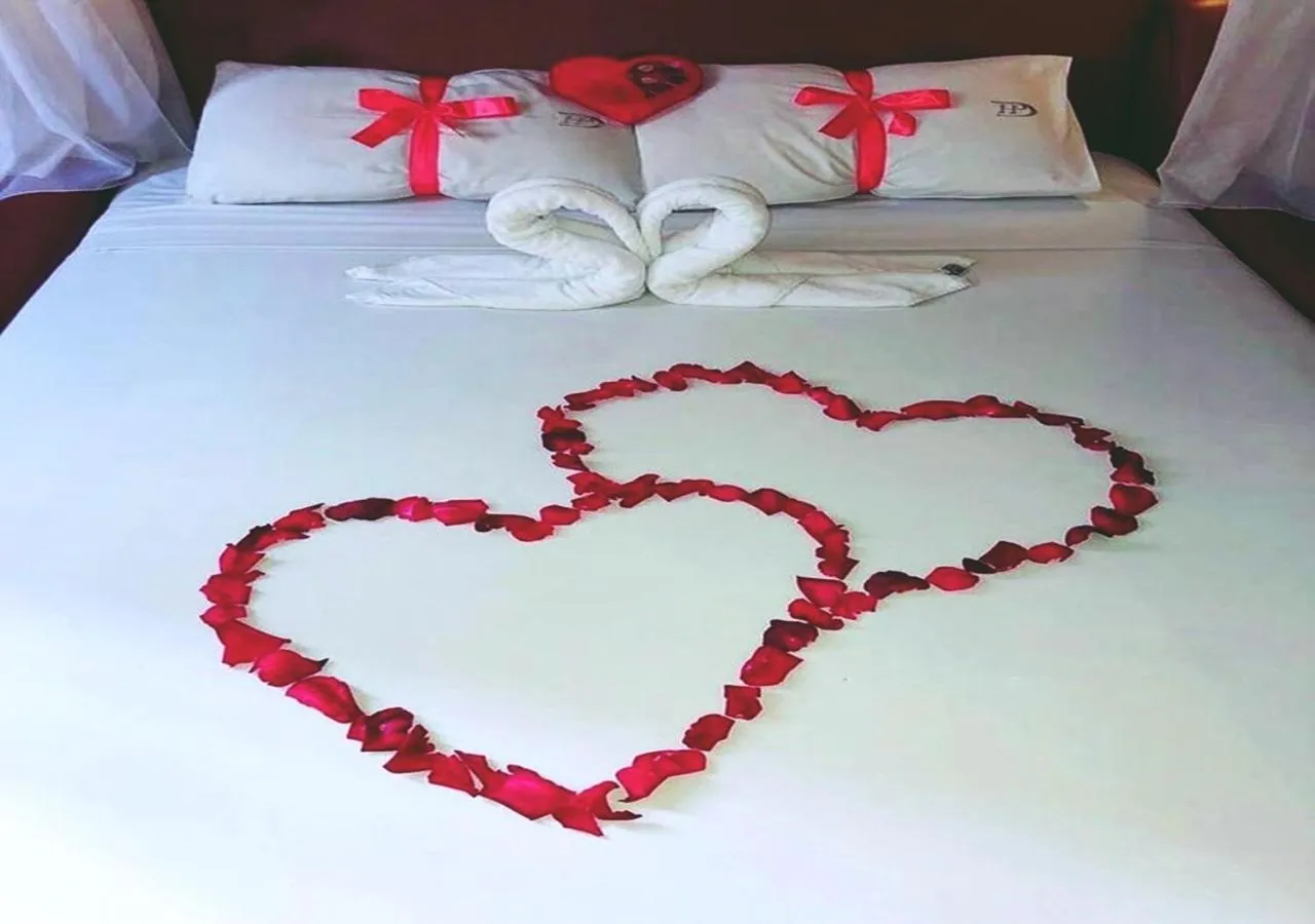 Bed in David Plaza Hotel