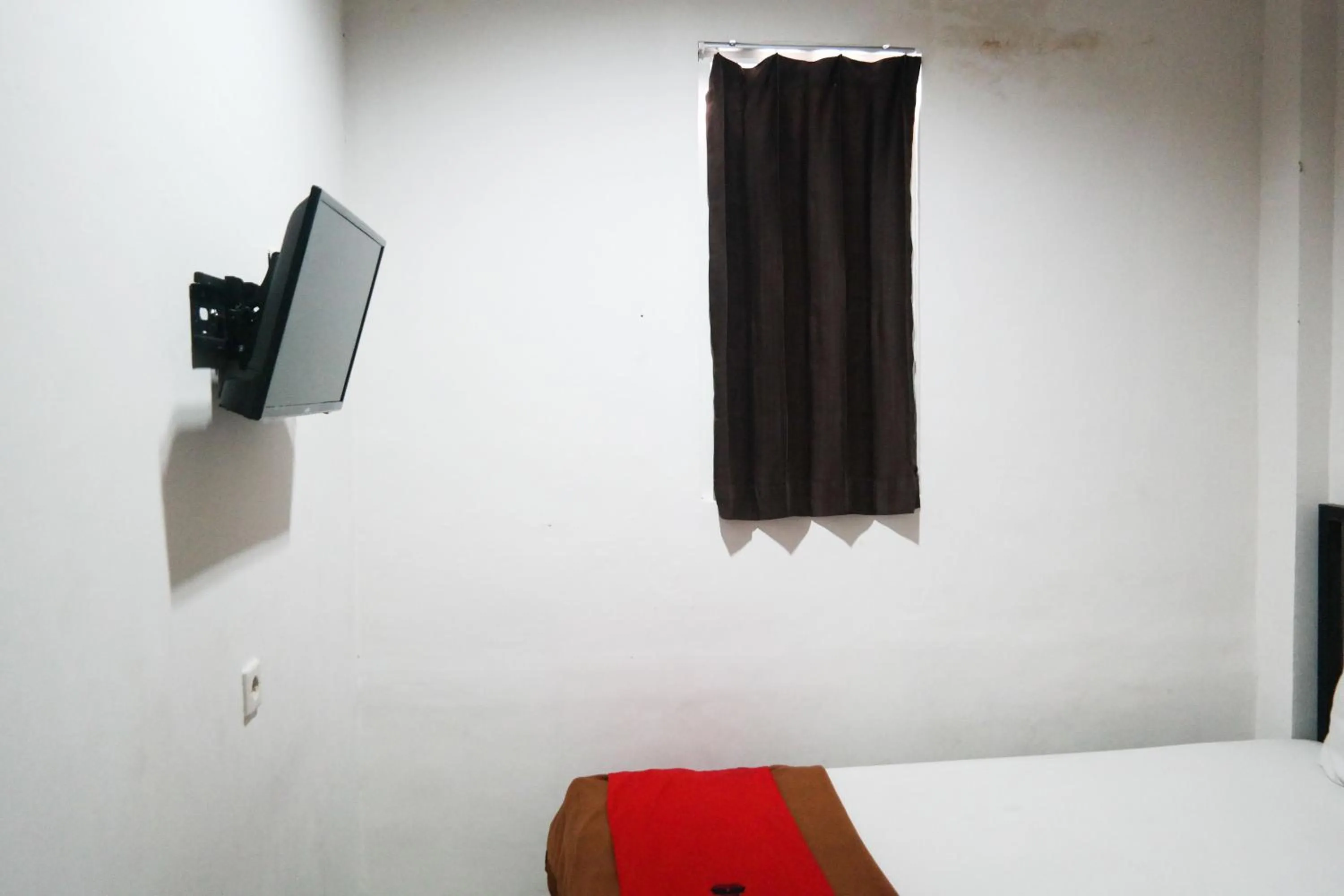 Bed in RedDoorz at Jalan Somba Opu Losari