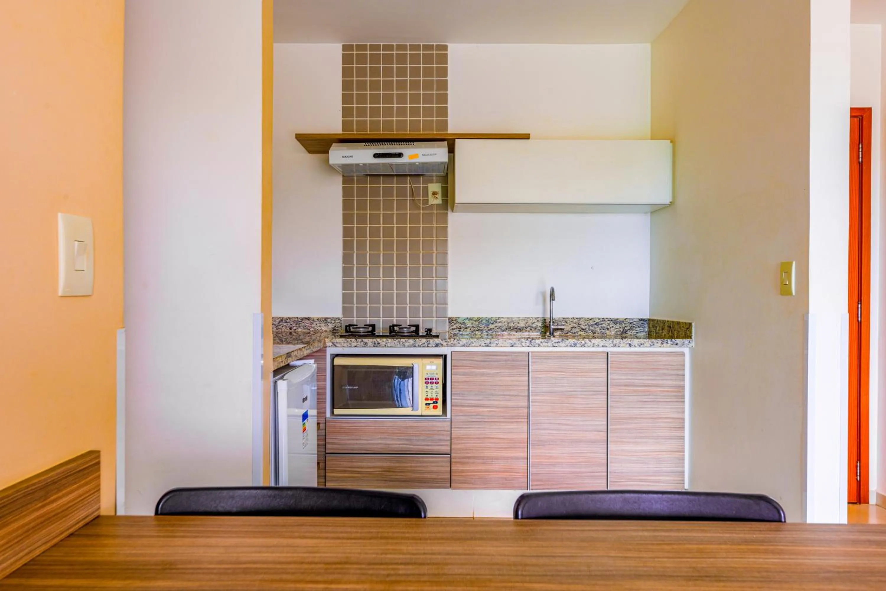 Kitchen or kitchenette in Riviera Park Hotel by WAM Experience