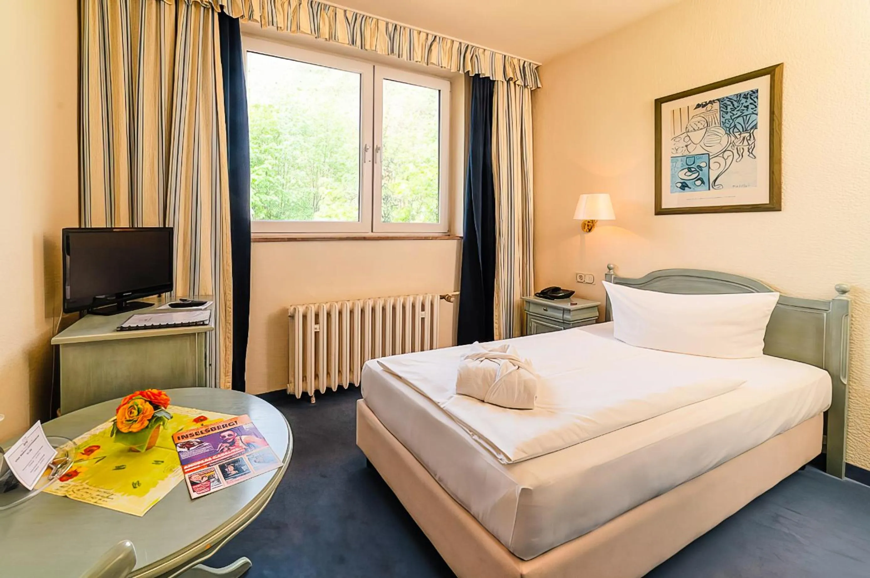 Bed in Wagners Hotel im Thüringer Wald