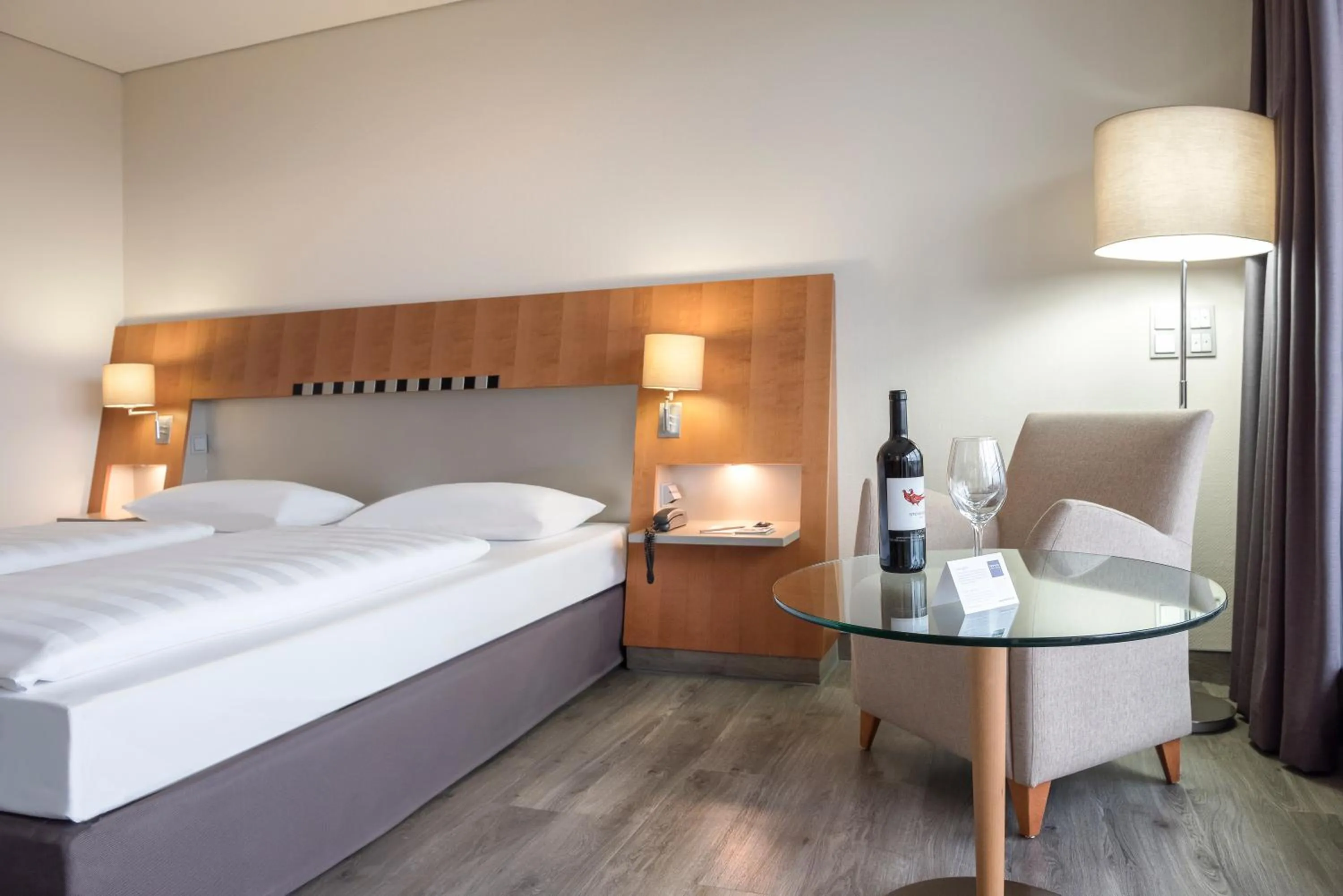 Photo of the whole room, Bed in Dorint Am Nürburgring Hocheifel