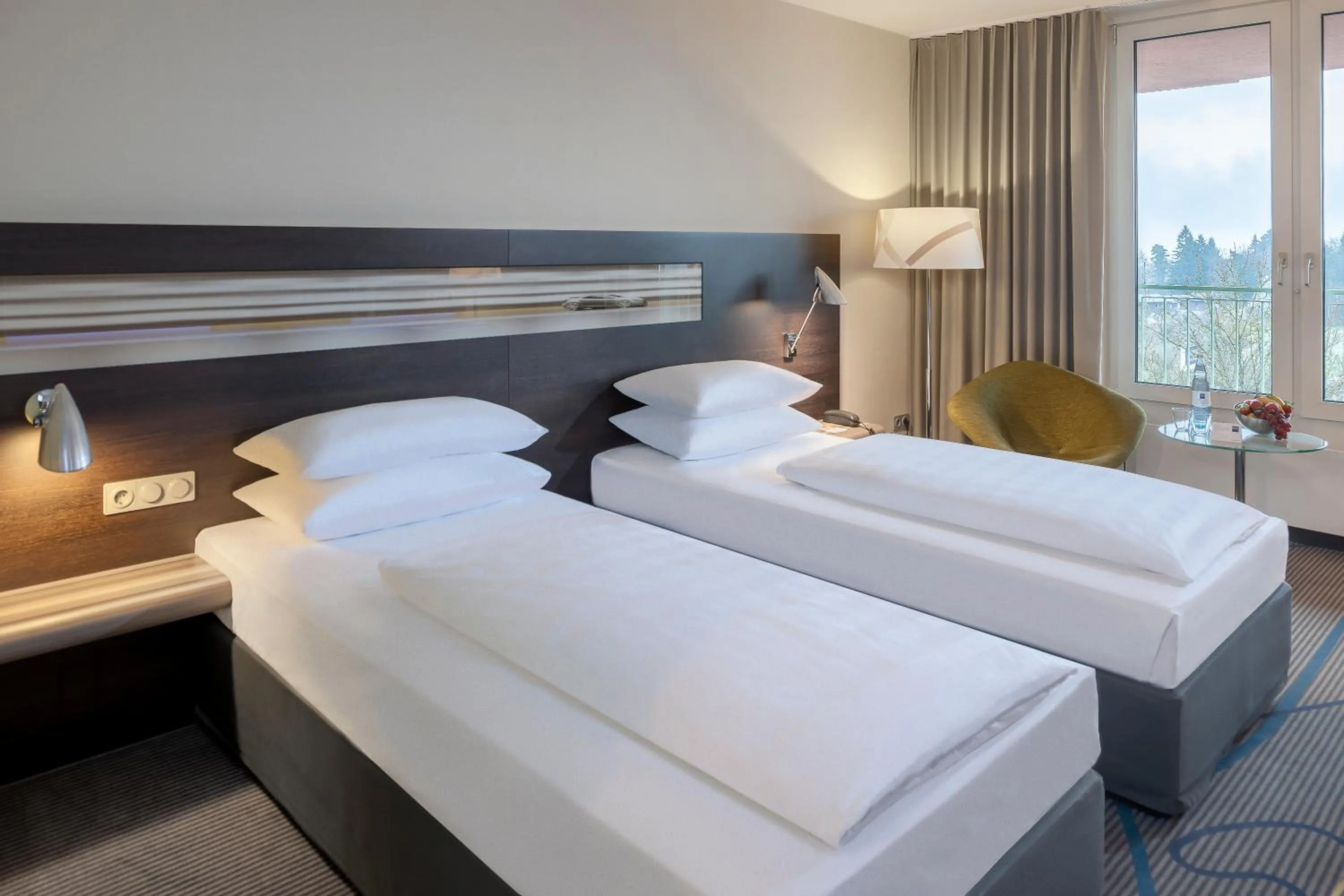 Photo of the whole room, Bed in Dorint Am Nürburgring Hocheifel