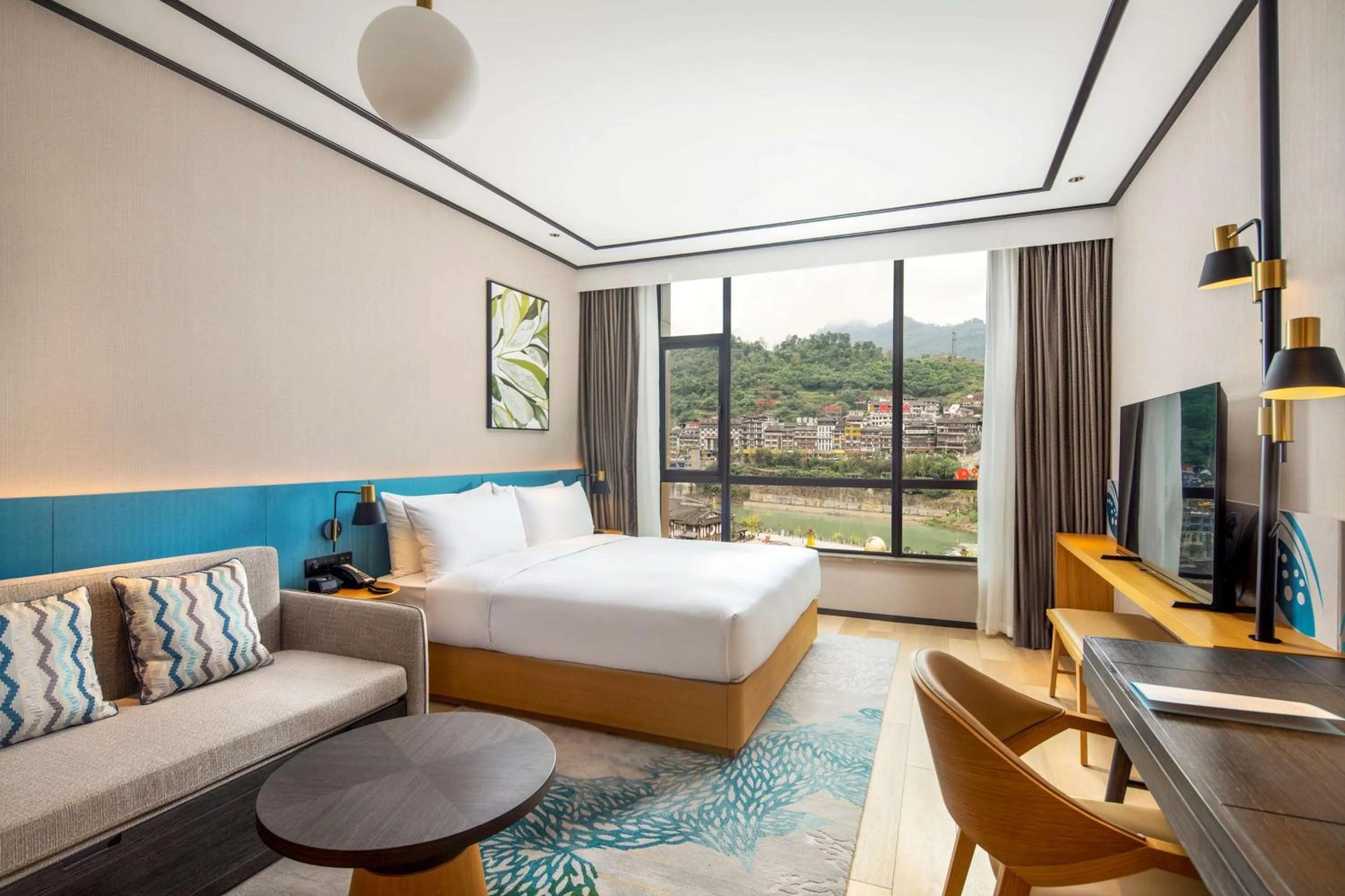 Living room, Bed in Hilton Garden Inn Guizhou Maotai Town
