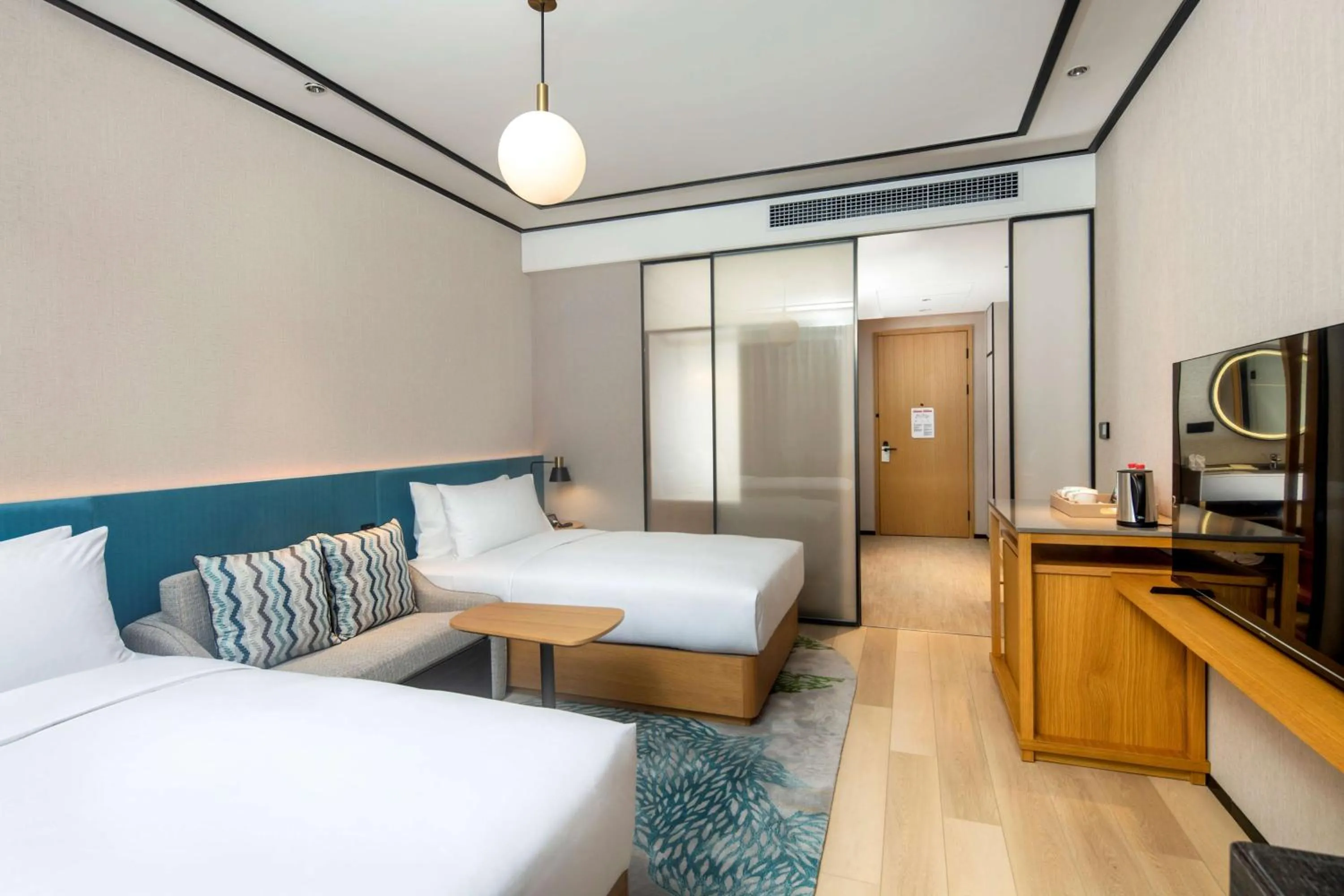 Living room, Bed in Hilton Garden Inn Guizhou Maotai Town