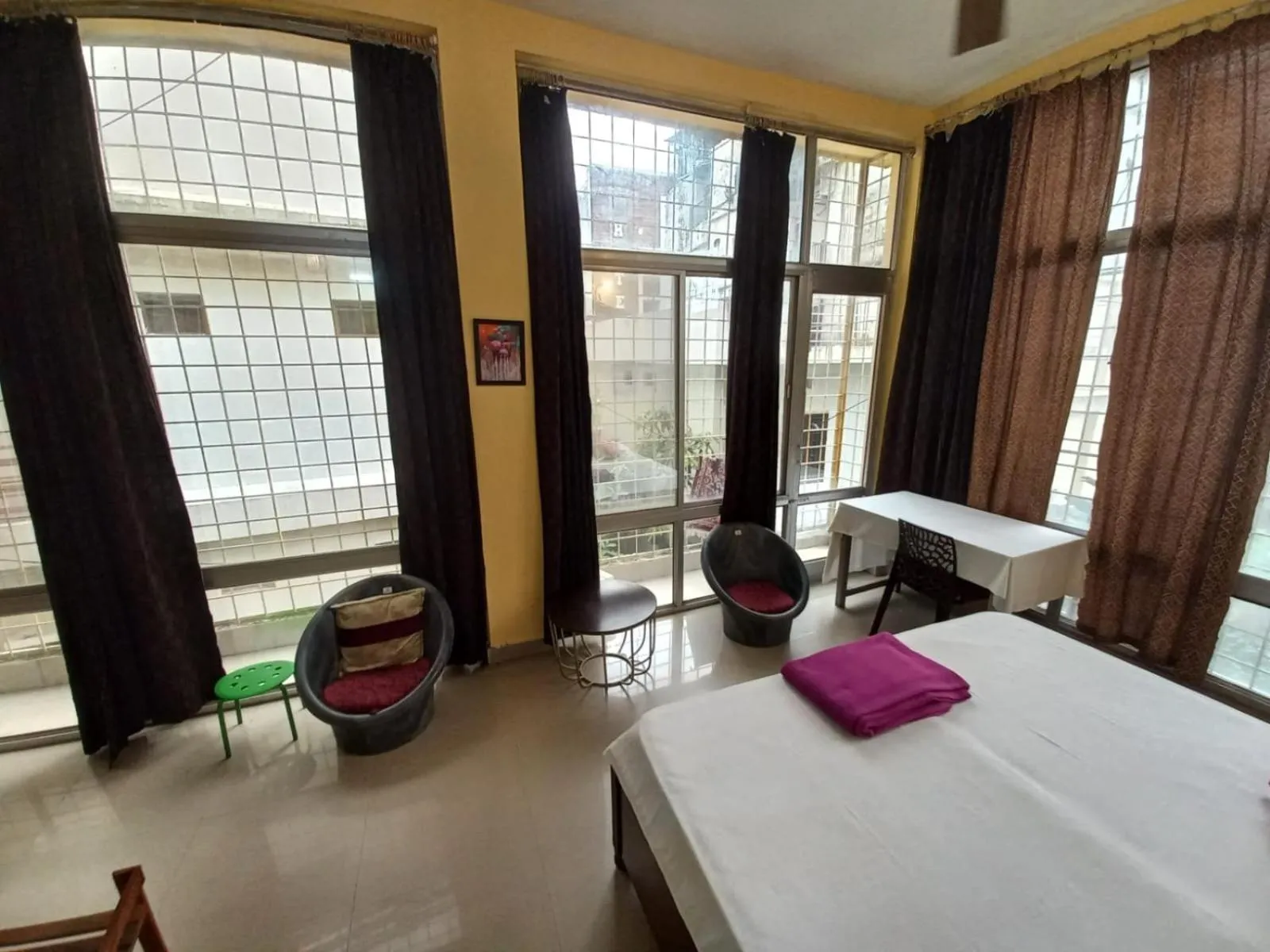 Photo of the whole room, Bed in Devi music ashram