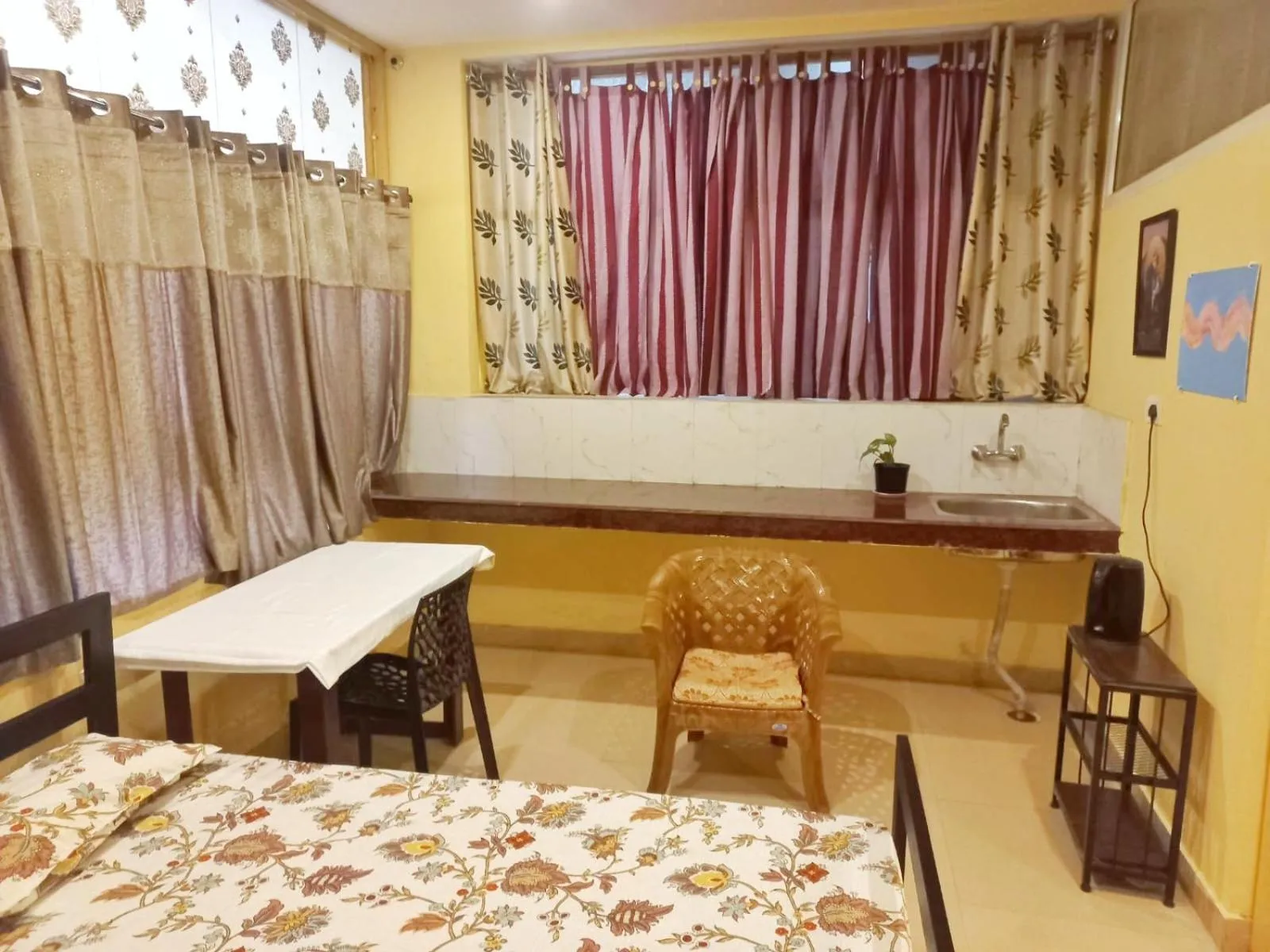 Photo of the whole room, Bed in Devi music ashram