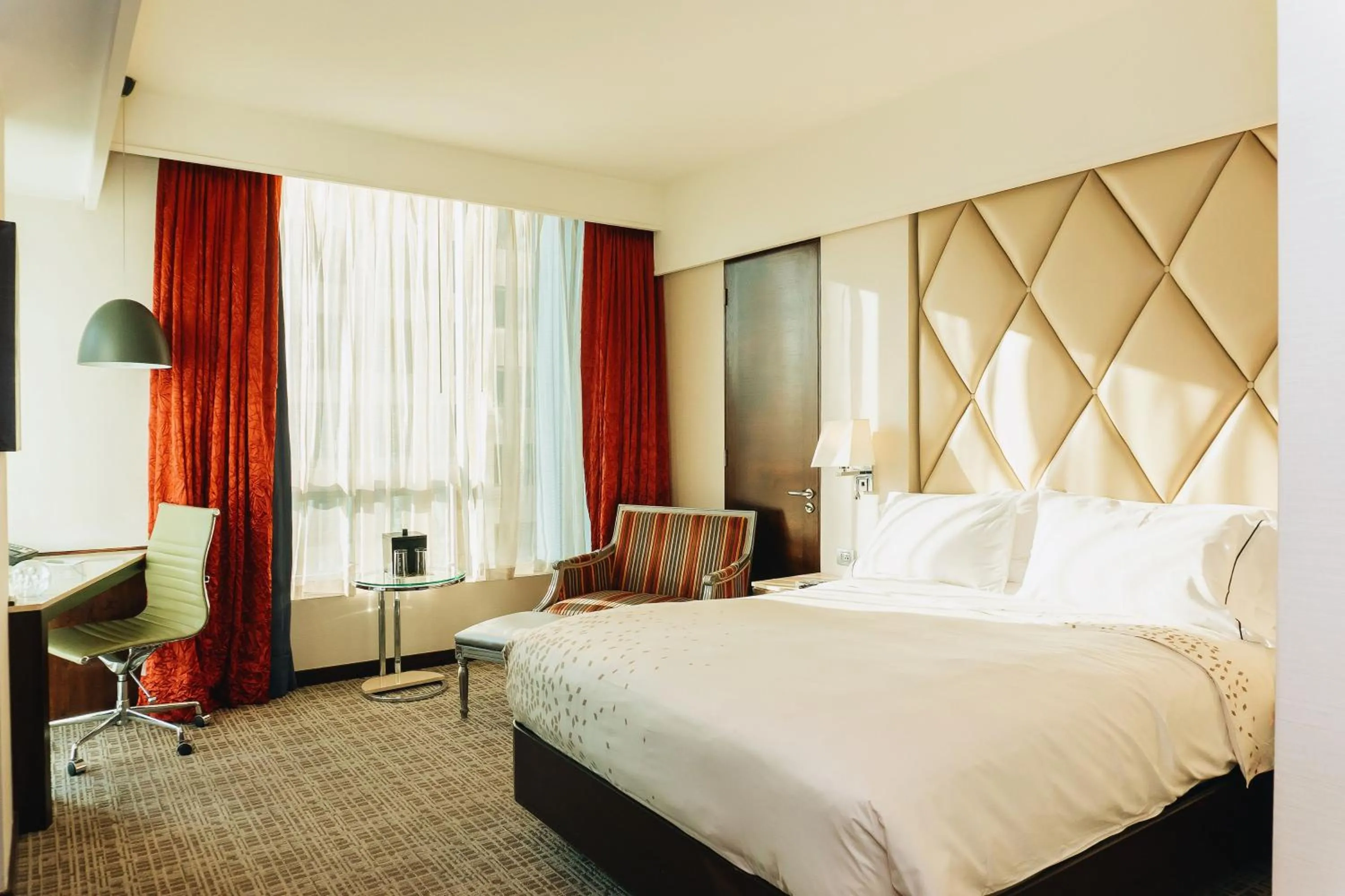 Bed in Renaissance Santiago by Marriott