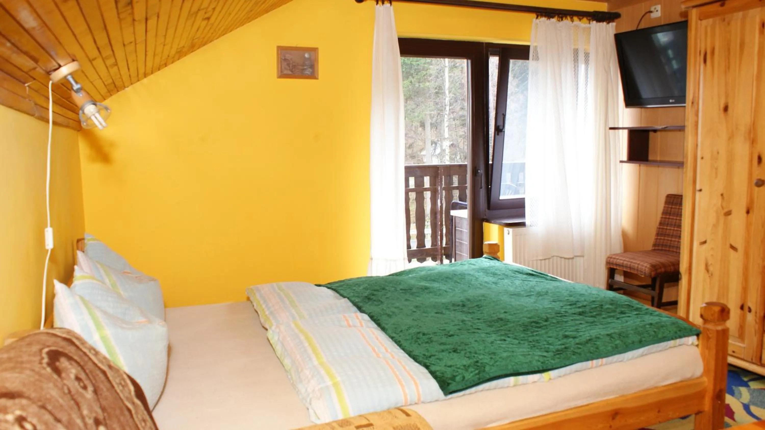 Photo of the whole room, Bed in Willa Andromeda