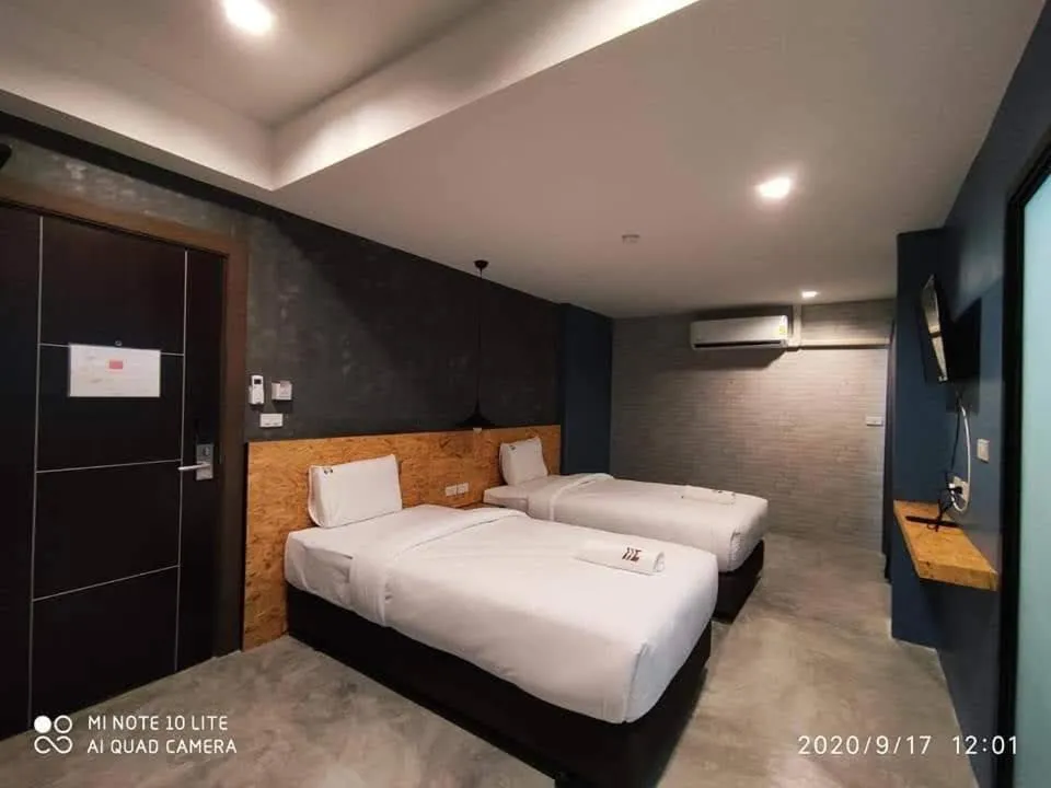 Bed in Modern Budget Hotel